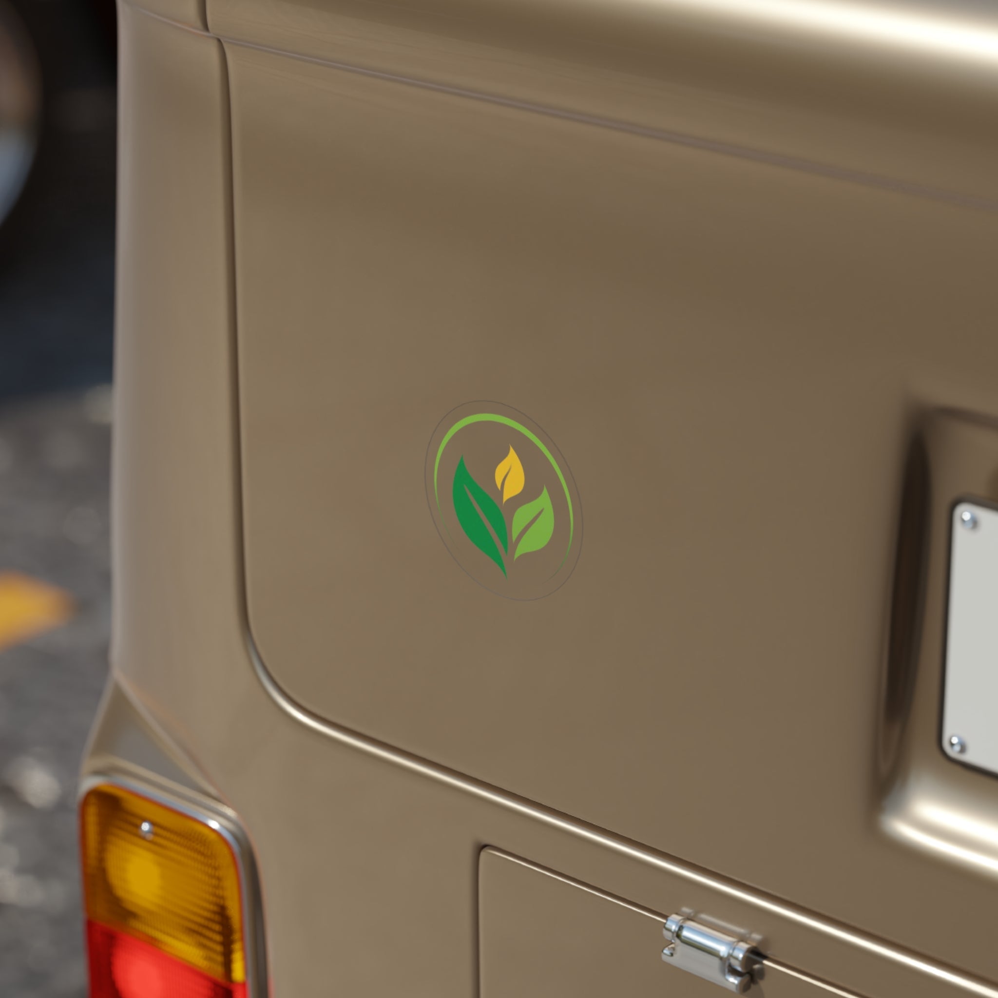 Eco-friendly logo transparent sticker on gold vehicle. Green leaves, branding, sustainable design, custom decal for business.