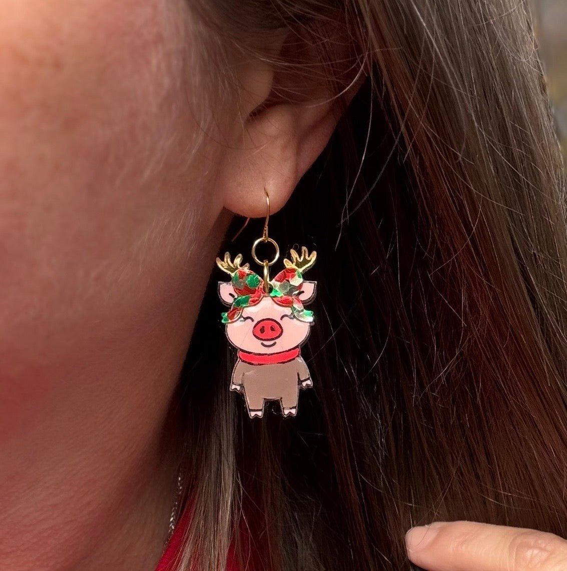 Reindeer Pig Christmas Earrings: Handmade acrylic holiday jewelry from Main Street Collective. Worn Festive Pig Earrings.