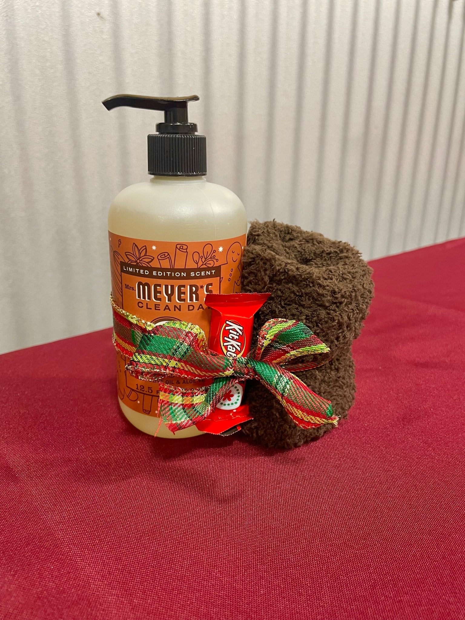 Cozy Holiday Gift: Mrs. Meyer's Gingerbread Soap, Fuzzy Socks & KitKat from Main Street Collective. Perfect festive bundle!