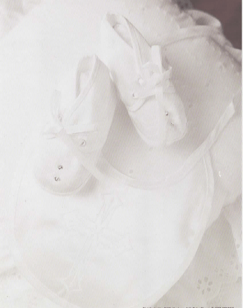 Personalized Baby Name Gift: White baby shoes and undershirt. Custom first name meaning keepsake by A & H Creative Names.