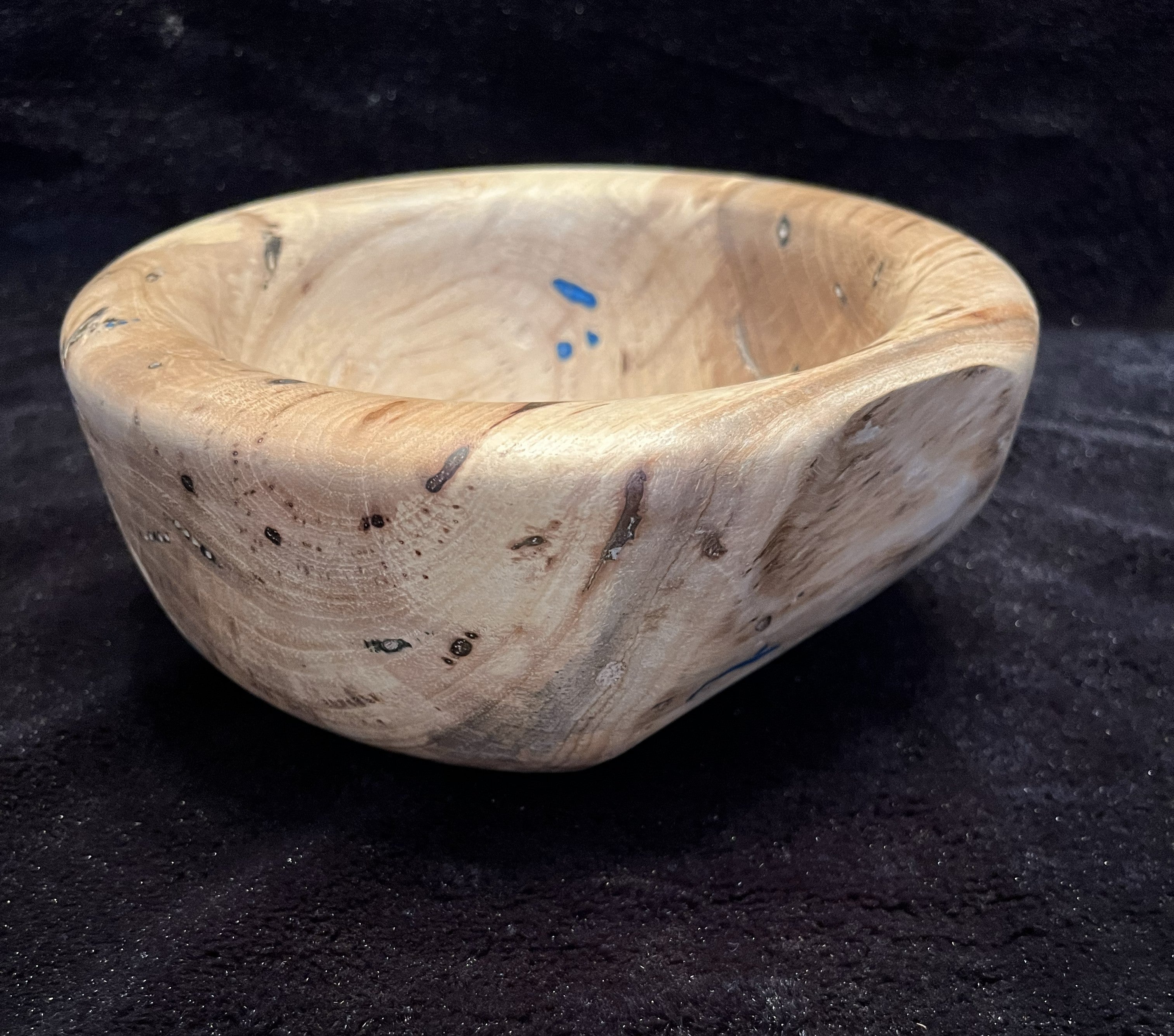 Handmade pecan bowl with blue epoxy accents. Unique woodturning art, a one-of-a-kind decorative wooden bowl.