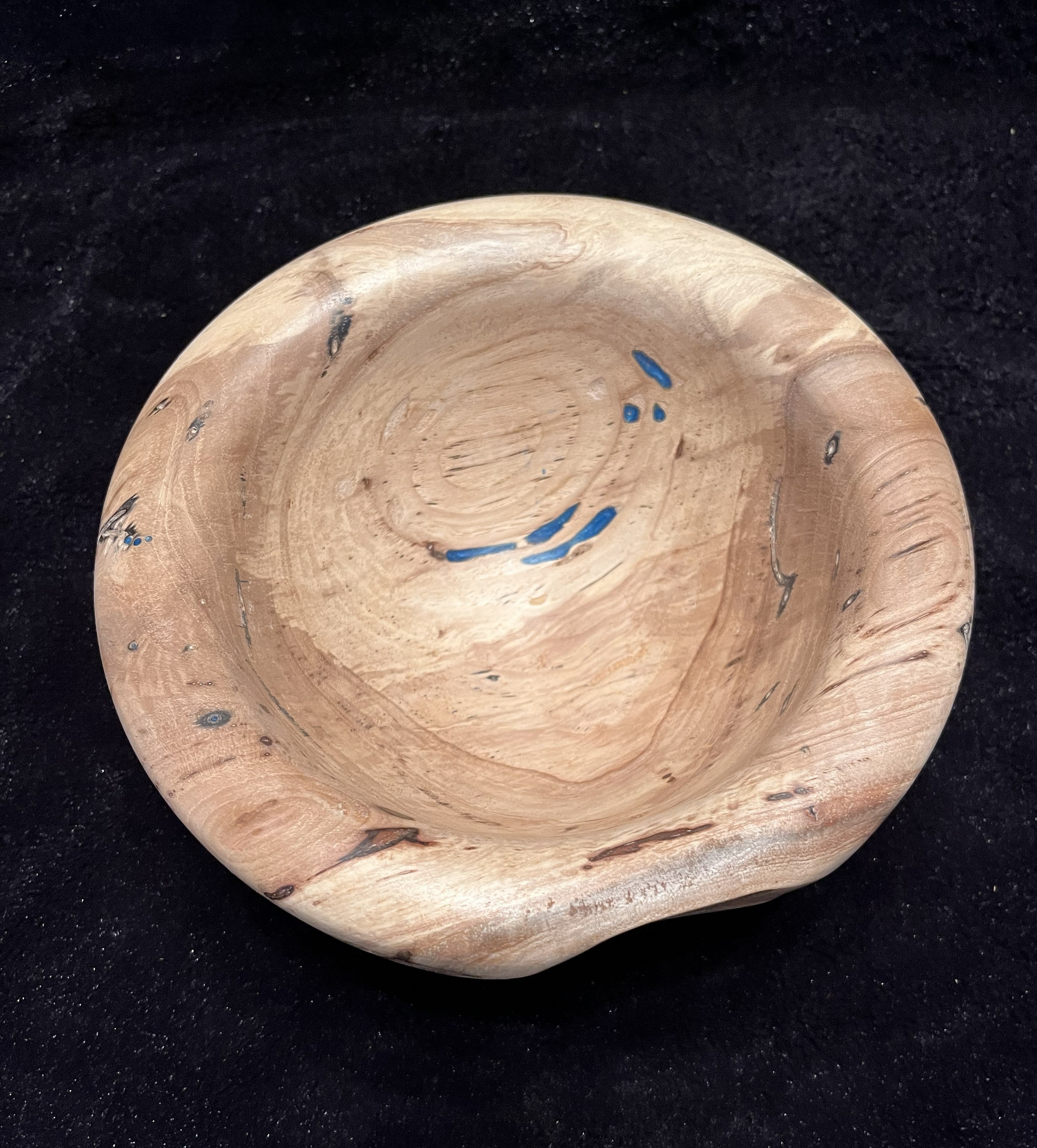 Hand-turned pecan wood bowl with blue epoxy accents. Unique home decor and conversation piece. 7" x 3".