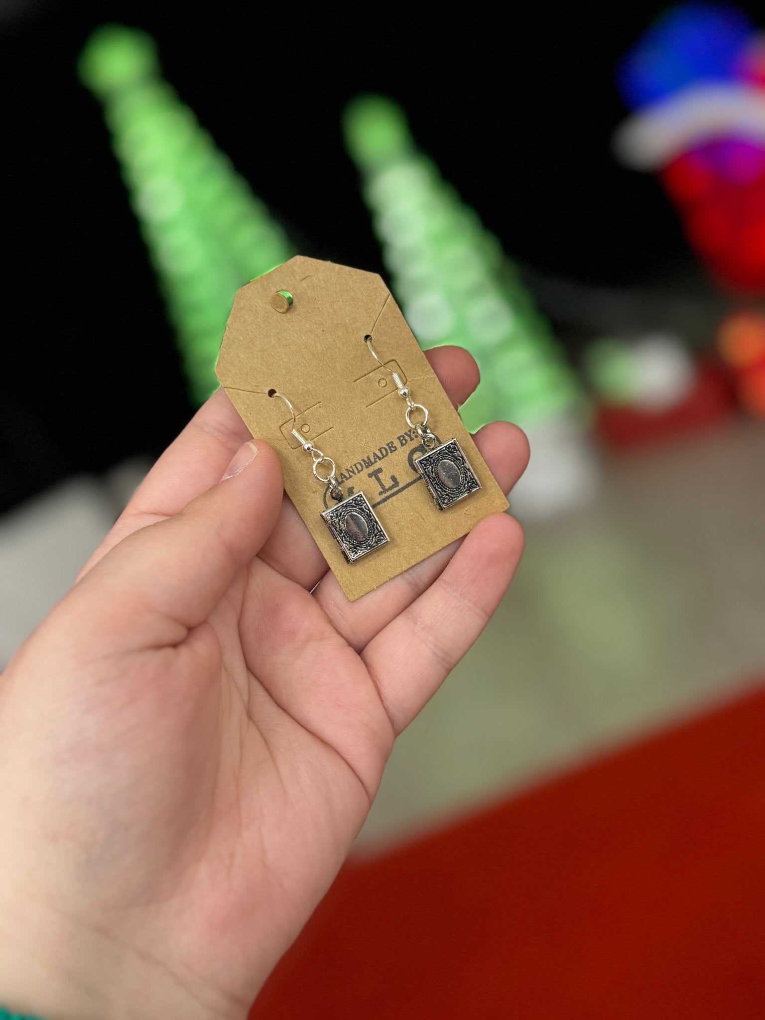 Silver Book Locket Earrings: Handmade Jewelry by Main Street Collective. Surgical Steel, Whimsical Style, for Book Lovers & Fantasy Fans.