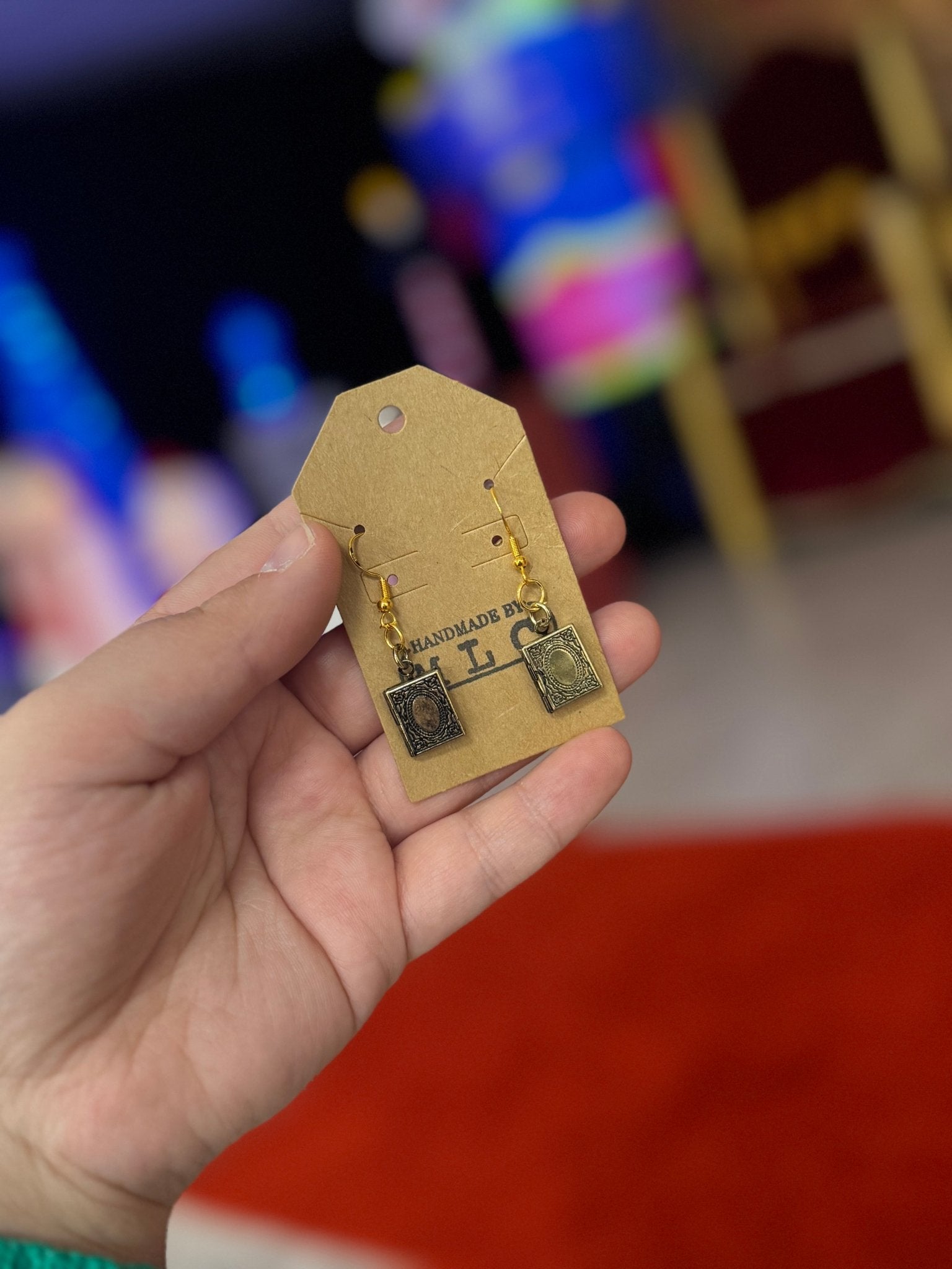 Handmade book locket earrings by Main Street Collective. Antique book earrings. Jewelry gift for book lovers.