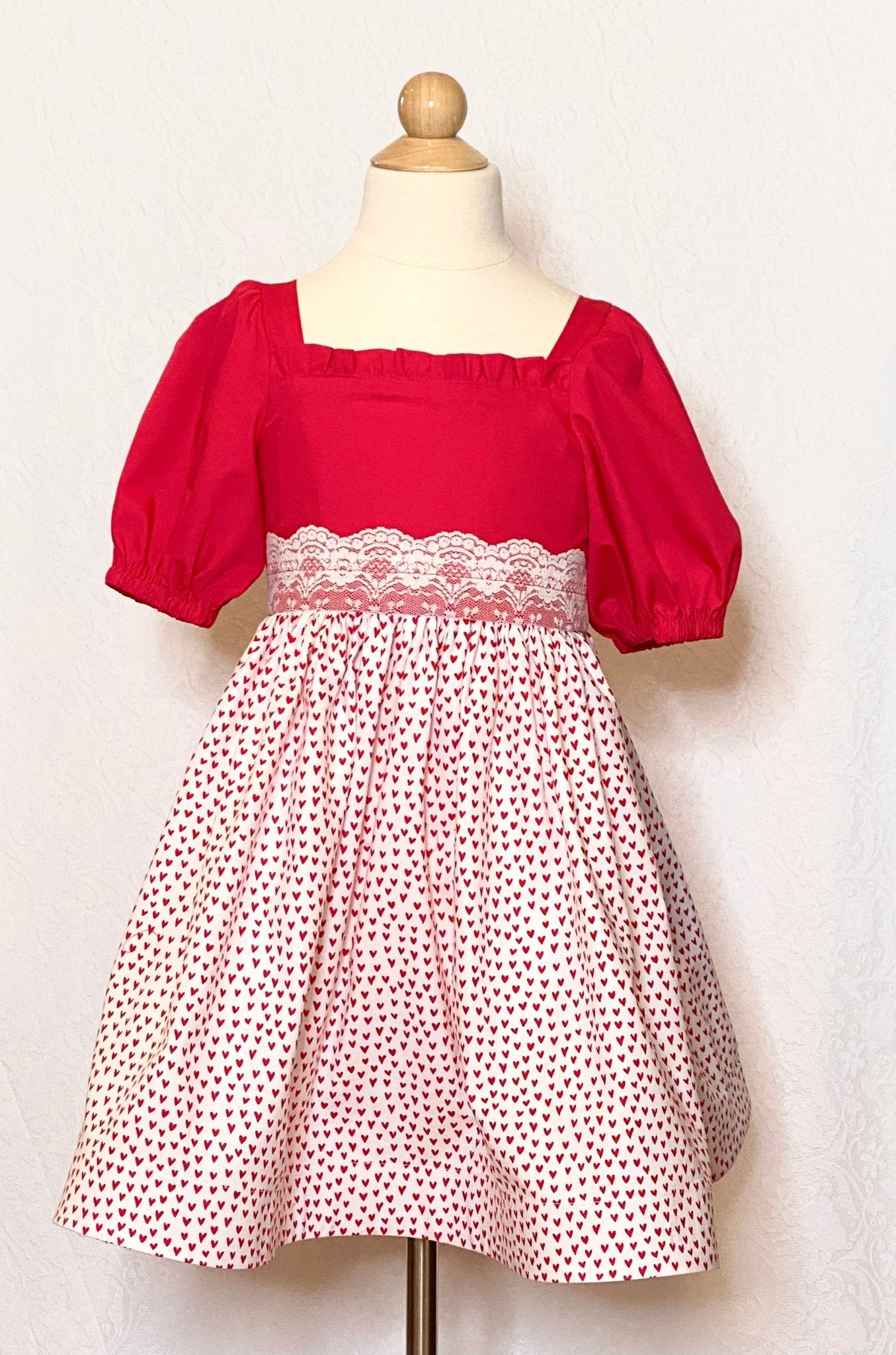 Girl's red and white heart print pettiskirt dress by Main Street Collective.