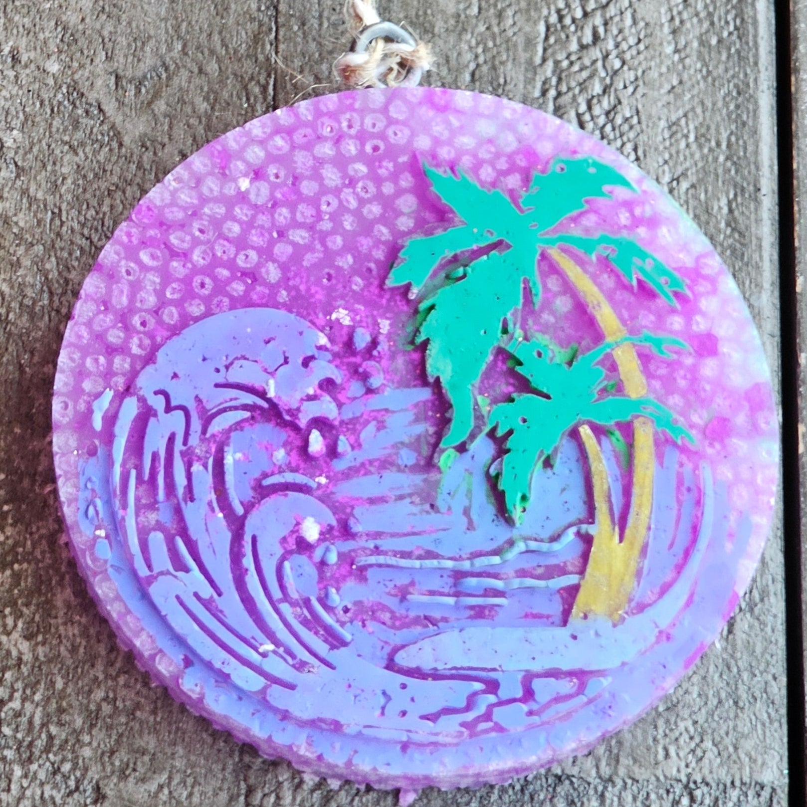 Handmade beach car freshie with ocean scene, palm trees, and waves. Aroma bead air freshener.