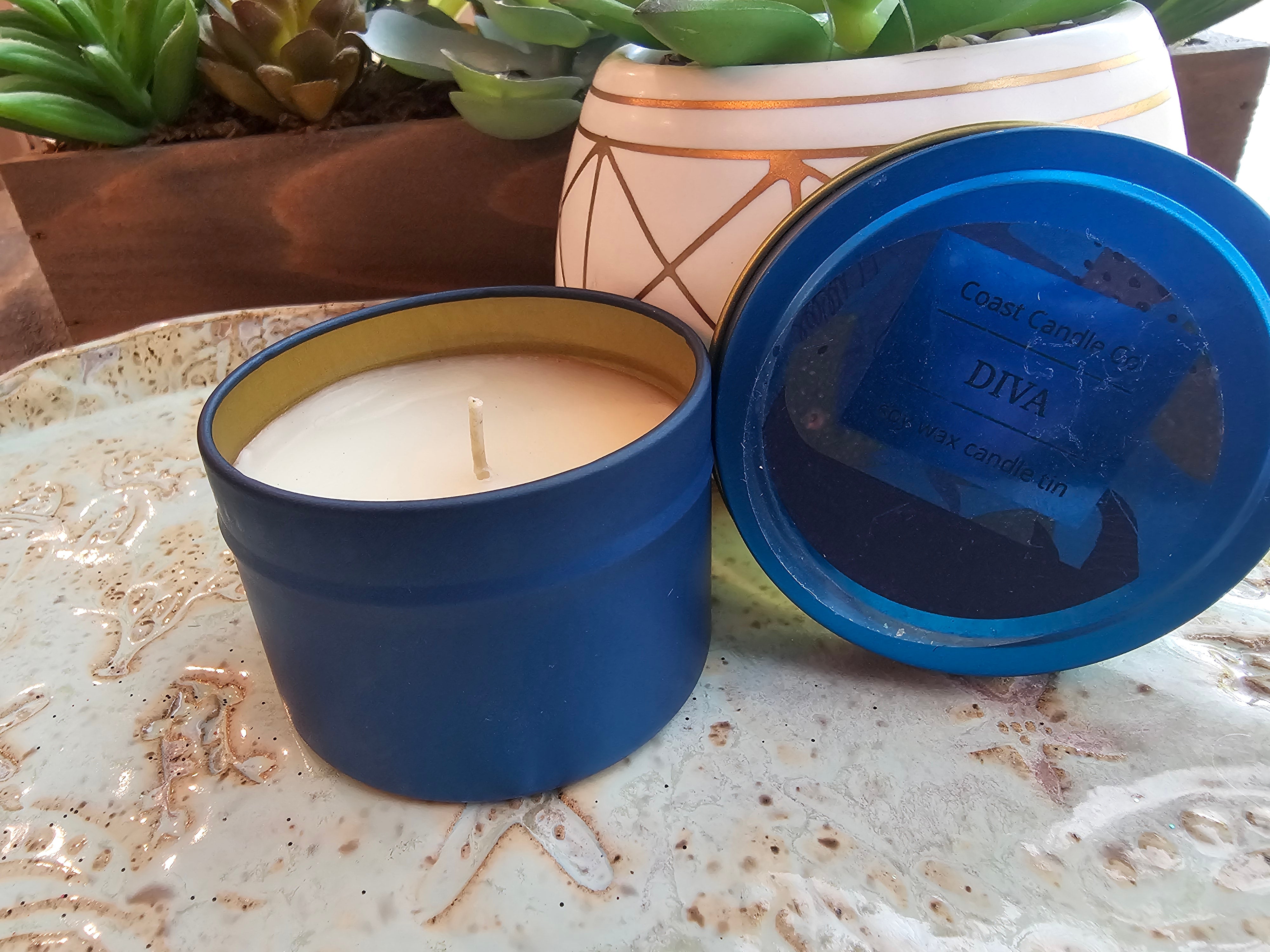Coast Candle Co. DIVA Candle Jar: Handcrafted luxury from Main Street Collective. Blue scented candle in tin.