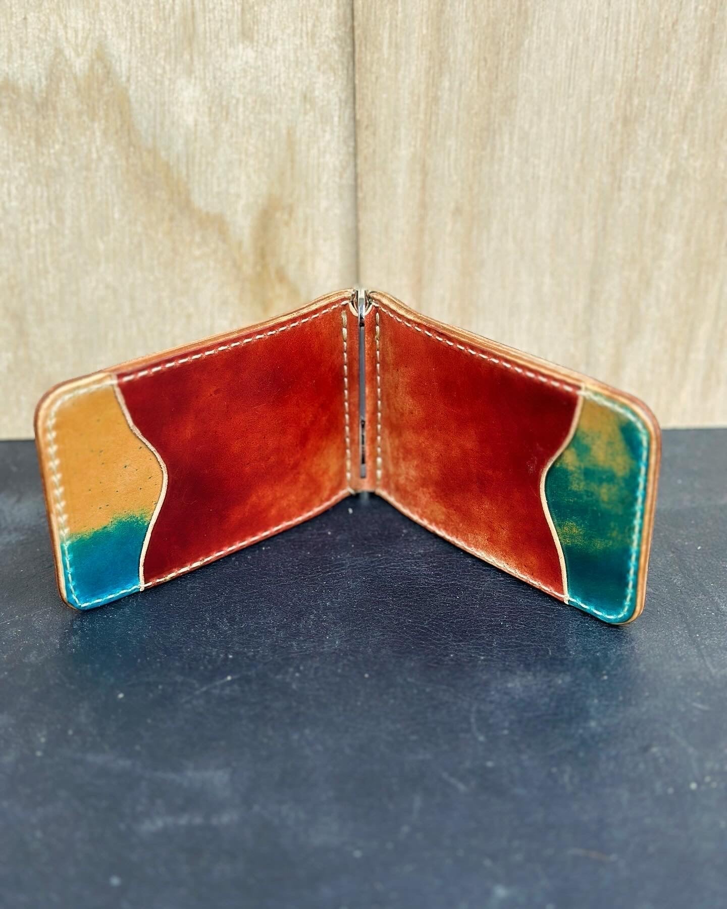Handmade leather money clip wallet by Main Street Collective. Unique design, custom color options available.