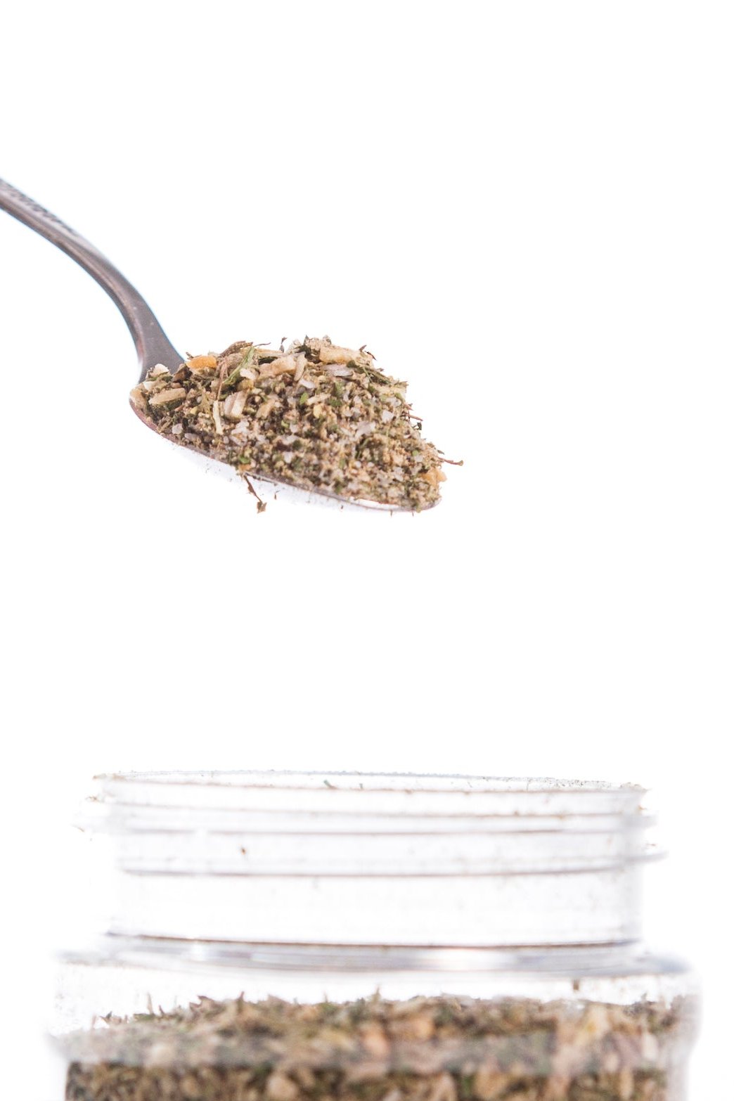 Poultry Blend Spice: Spoonful of Main Street Collective blend ready to flavor chicken, turkey, or pork.