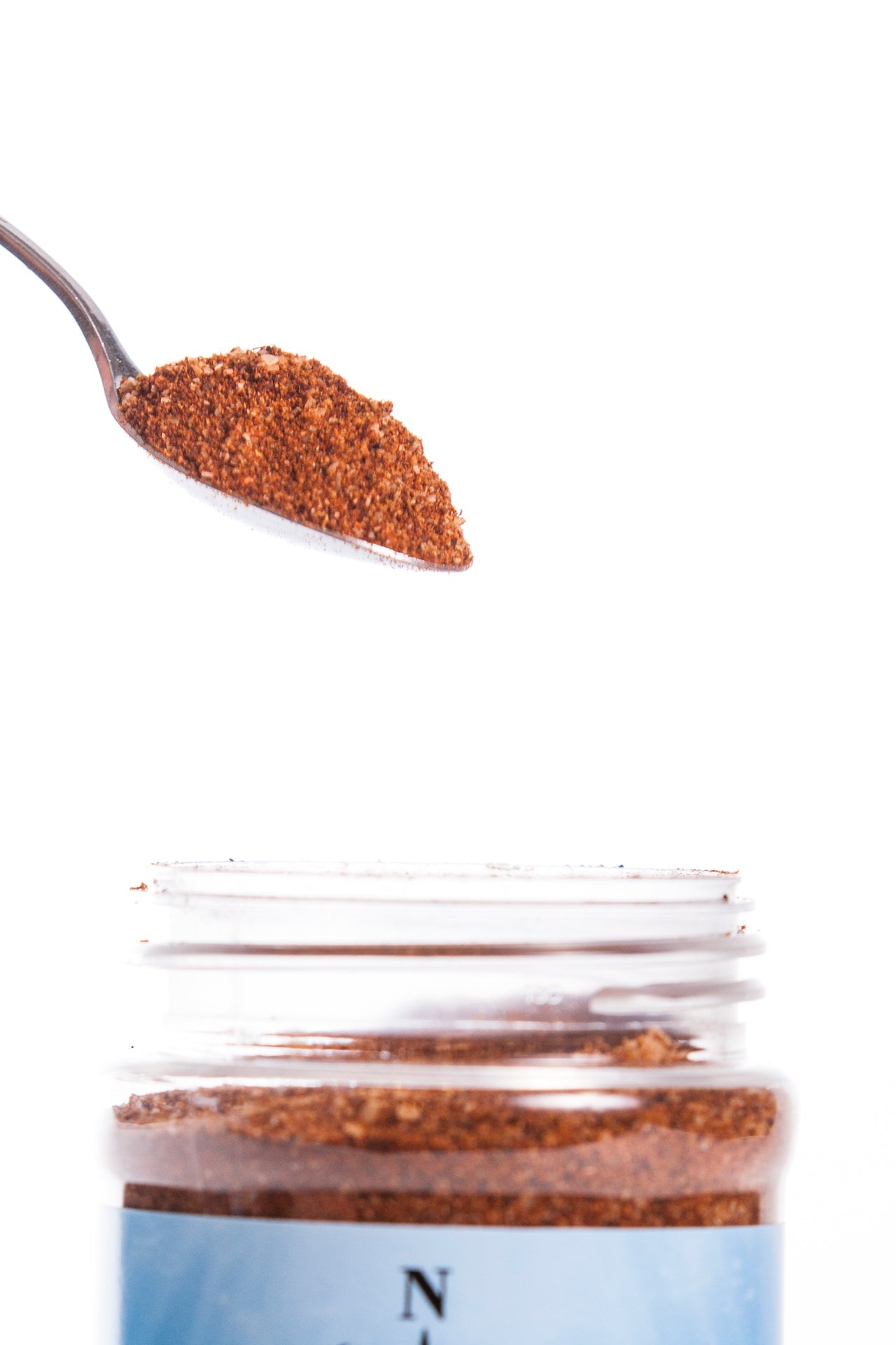 BBQ Blend Spice: Spoonful of Main Street Collective Seasoning Over Jar - Regular BBQ Seasoning
