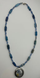 Soulful designs 18" necklace with Blue Agate beads with resin and dried flower charm