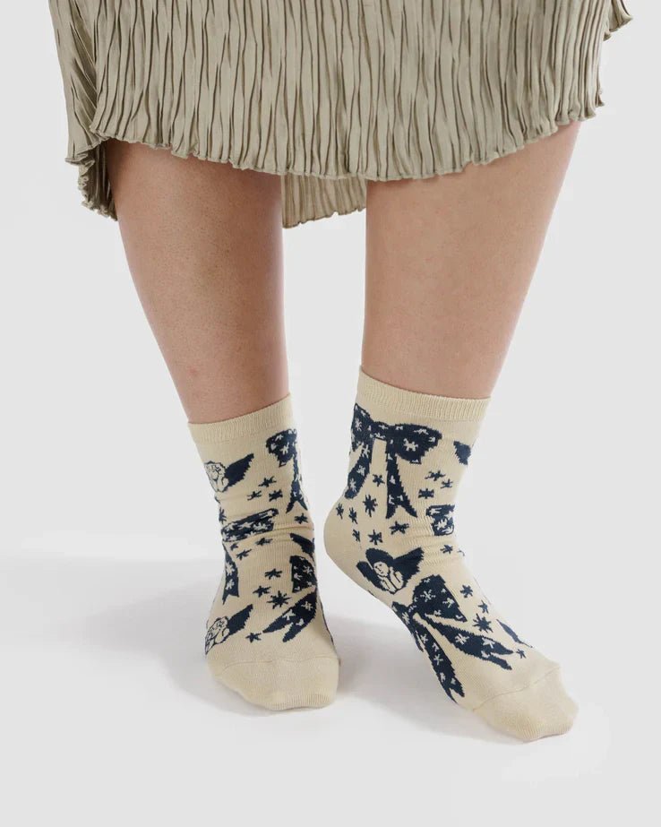 Baggu Crew Socks - Cherub Bows: Soft Bamboo Rayon socks with cherubs, bows, and stars pattern. One size fits women's 6-11, men's 4.5-9.5