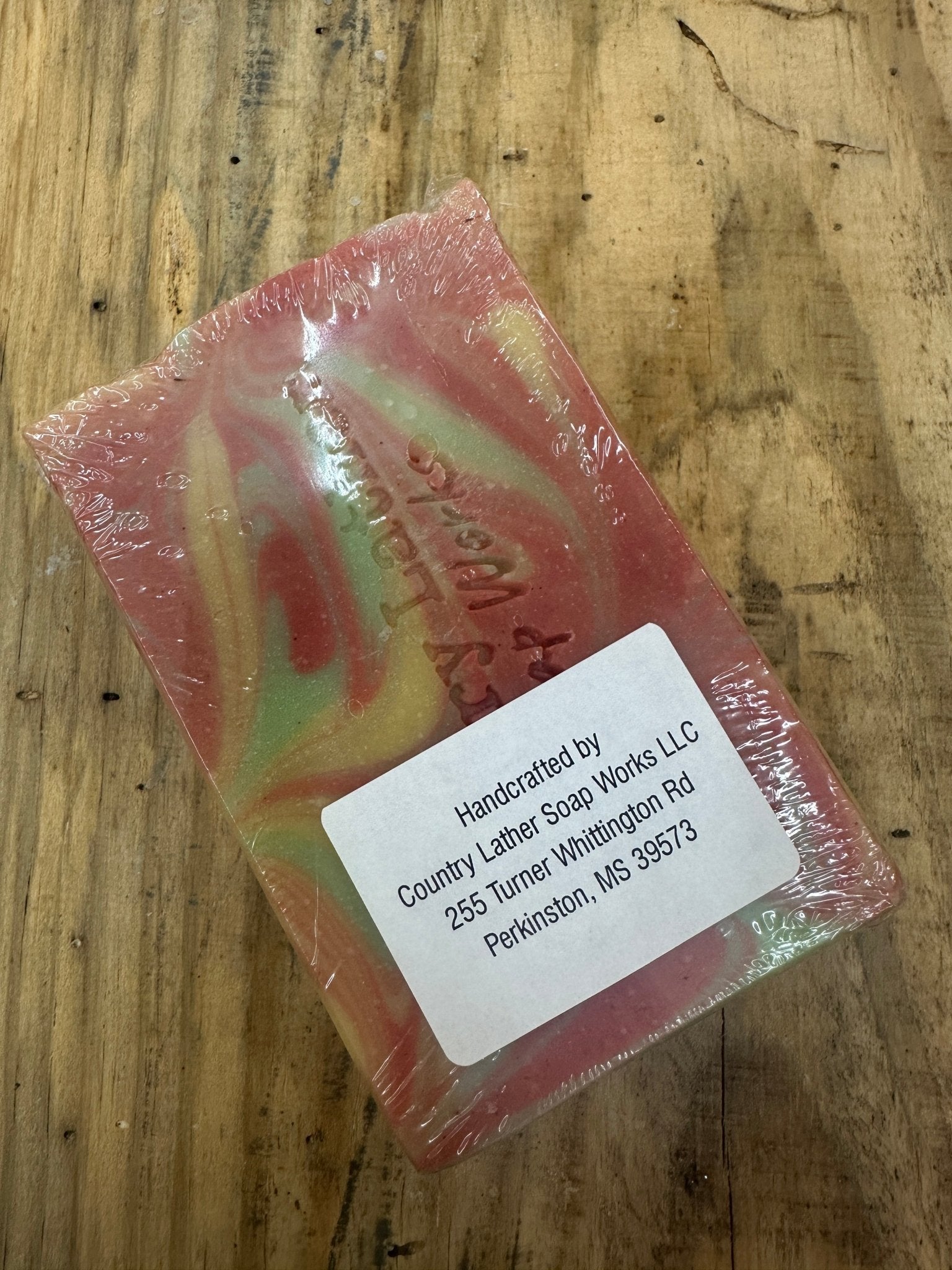 Handmade Melon Patch Goat Milk Soap by Country Lather Soap Works LLC - Perkinston MS, wrapped in plastic.