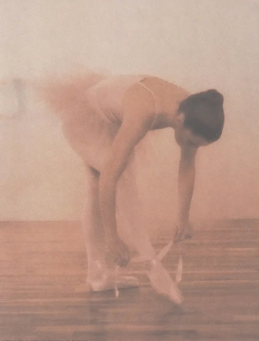 Ballerina tying pointe shoes, ballet dancer, ballet shoes, ballet training