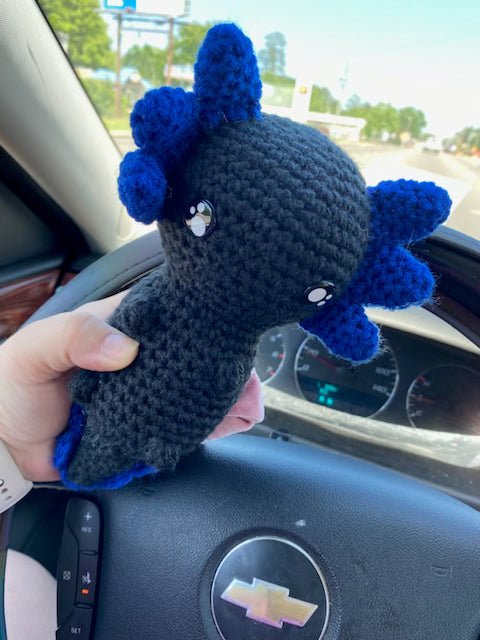 Ace the Axolotl plush - handmade crochet toy available in custom colors.