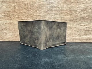 BI-FOLD WALLET. Leather Bi-fold wallet with card slots and money pouch. Main Street Collective.