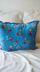 R.H.D.C. elegant throw pillow on a neatly styled bed – bedroom home décor upgrade.

