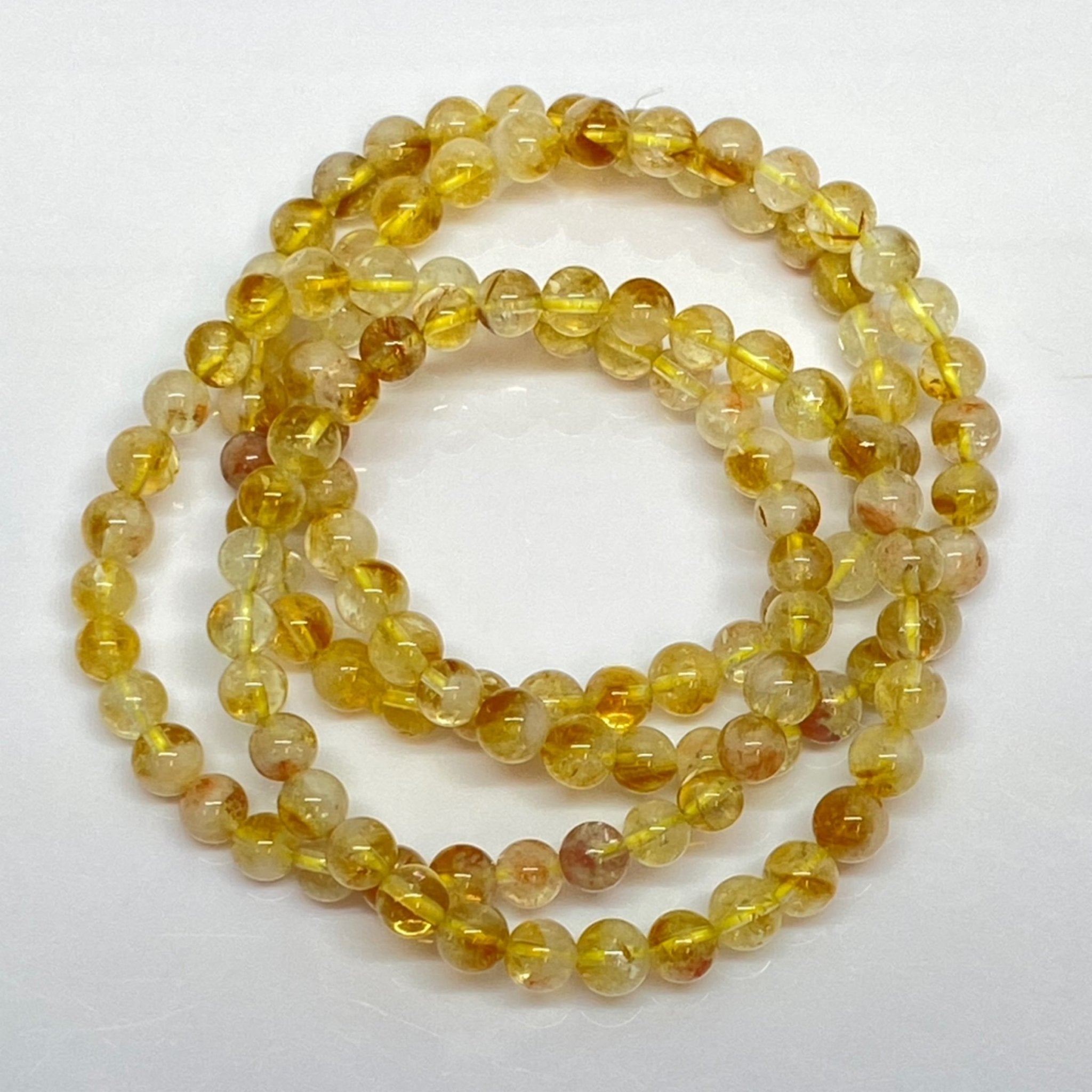 Handmade Citrine bracelet with 6mm golden natural gemstone beads from Hands of Earth Energy