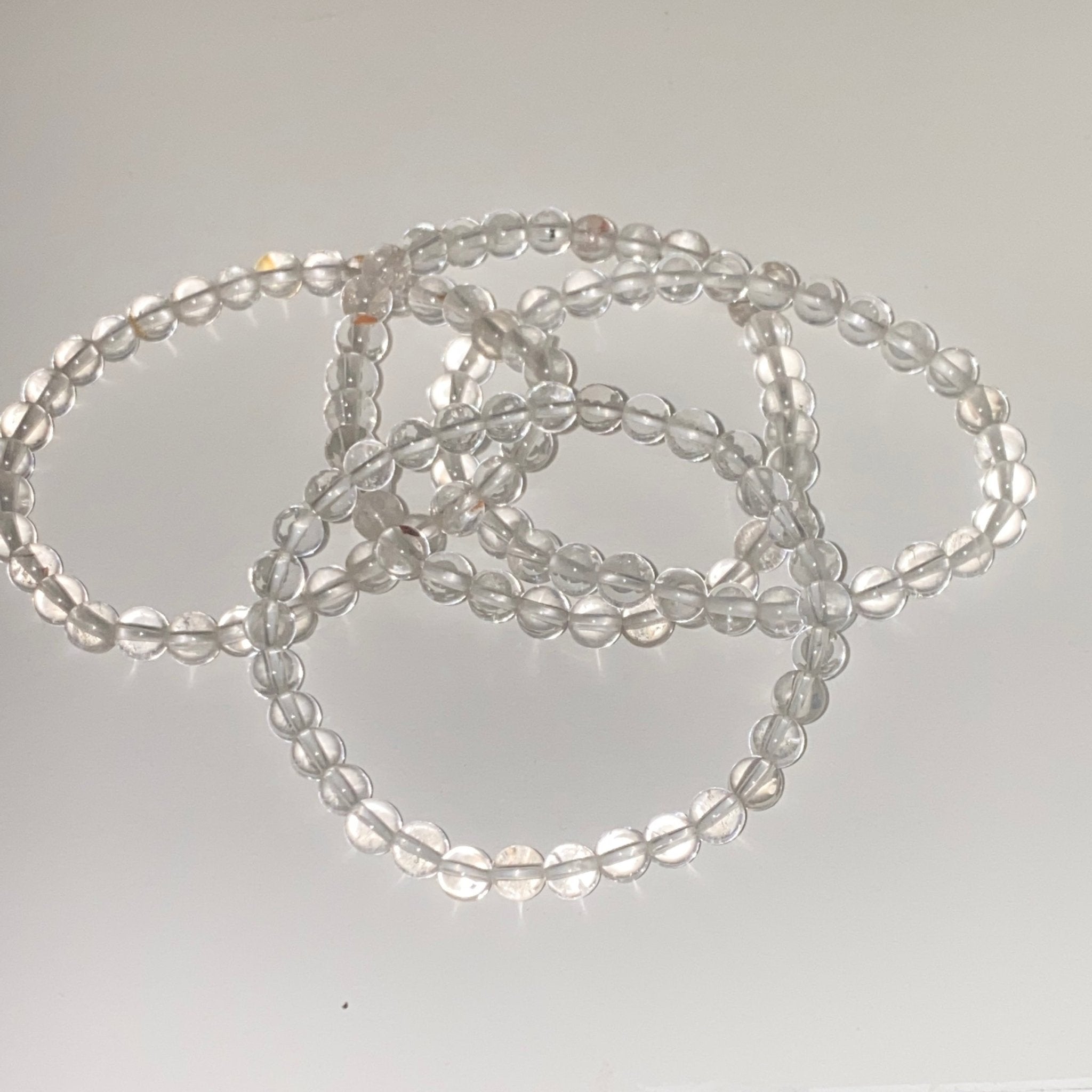 Handmade Clear Quartz bracelet with 6mm natural gemstone beads from Hands of Earth Energy