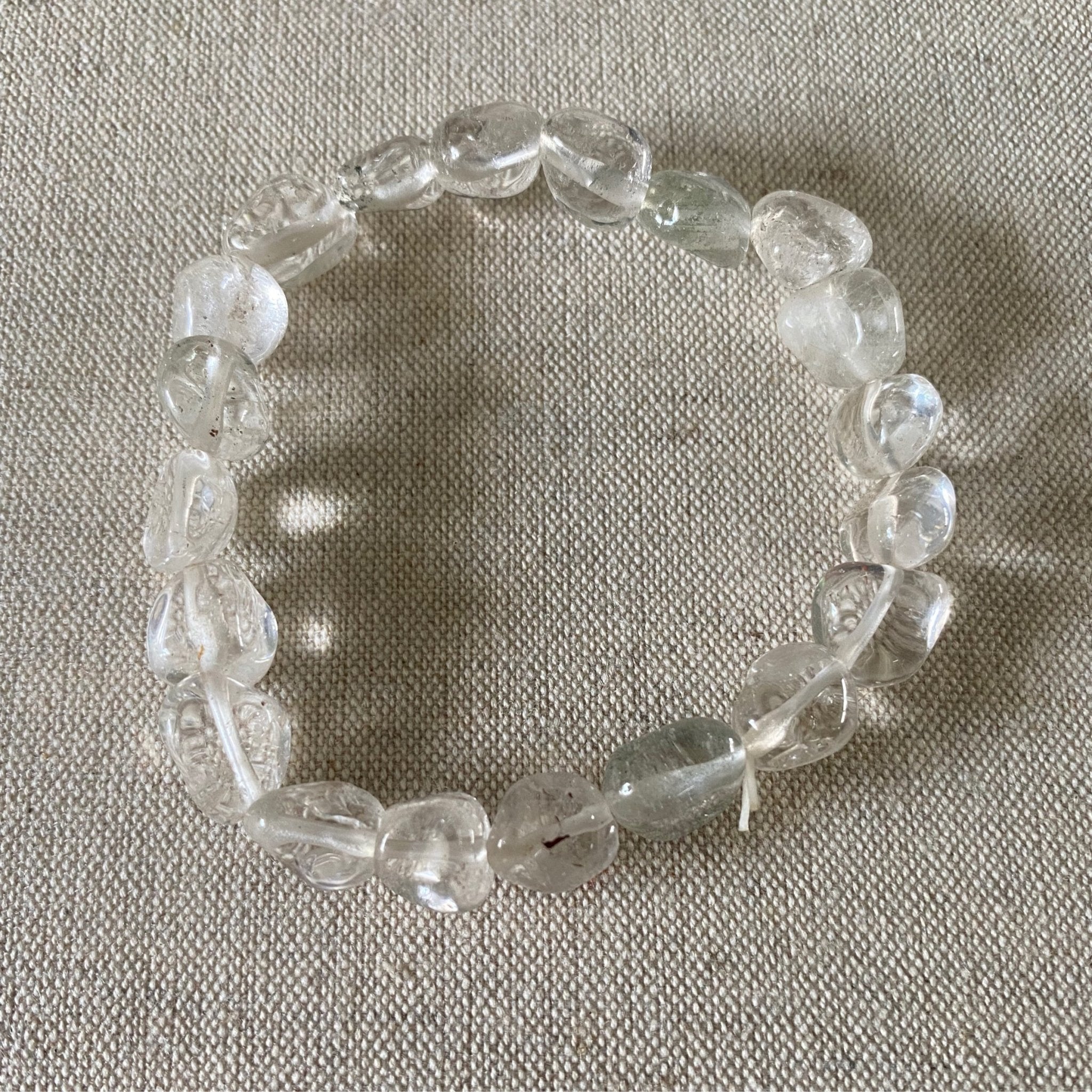 Handmade Clear Quartz bracelet with 8mm natural gemstone beads from Hands of Earth Energy