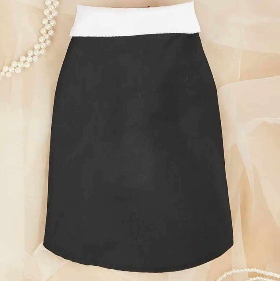 Close-up Backof formal dog tuxedo and bow tie curated by Coastal Couture Pet Boutique


