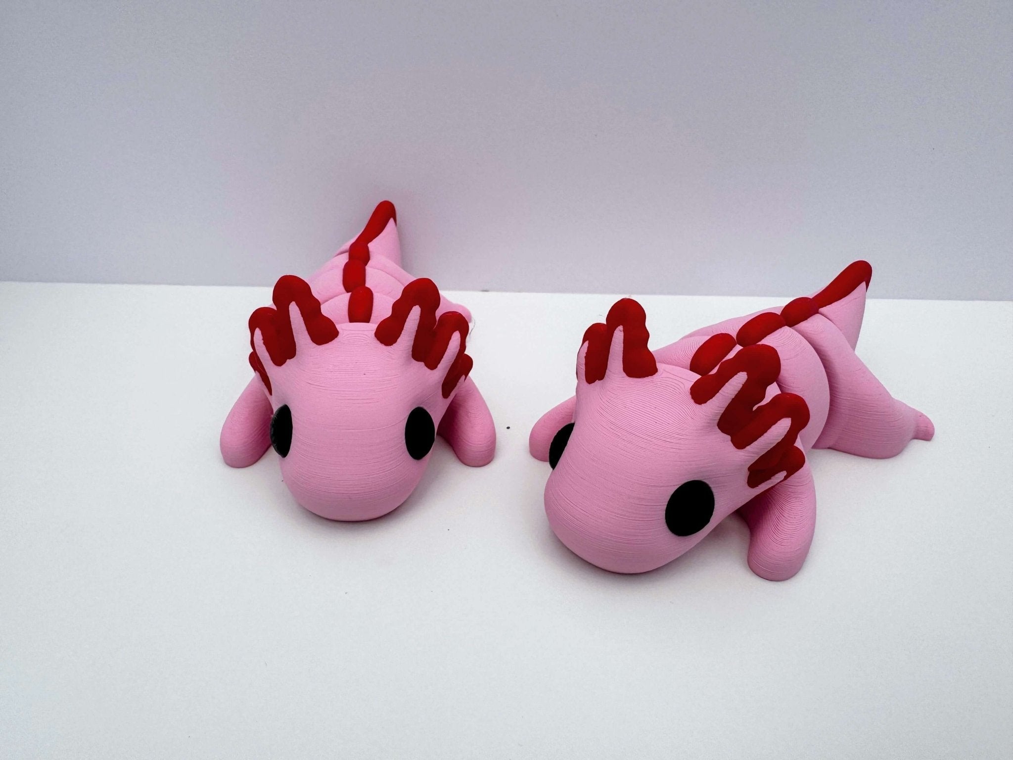 Pink Axolotl Fidget Toys: Handmade 3D printed sensory toys for stress relief & focus. Fun & Flexible! 