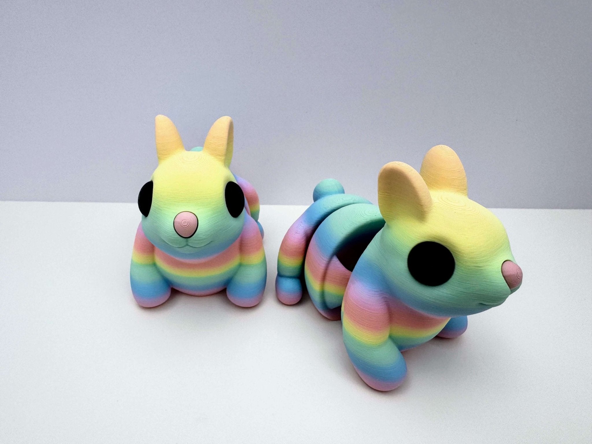 Pastel Rainbow Bunny Fidget Toys - Multiple, 3D Printed Sensory Toys. Mushroom Lady Co. Articulates and moves.
