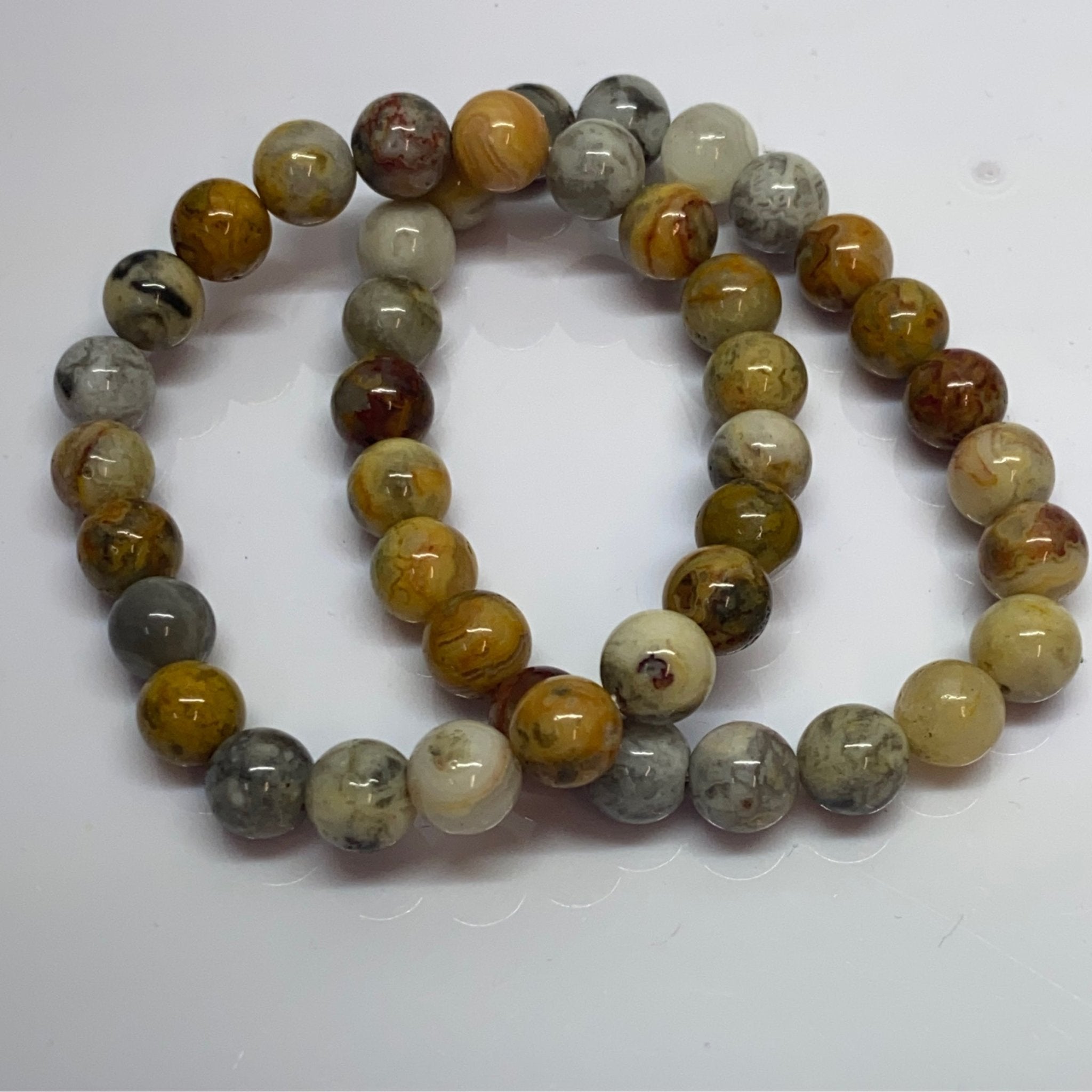 Handmade Crazy Lace Agate bracelet with 8mm natural gemstone beads from Hands of Earth Energy