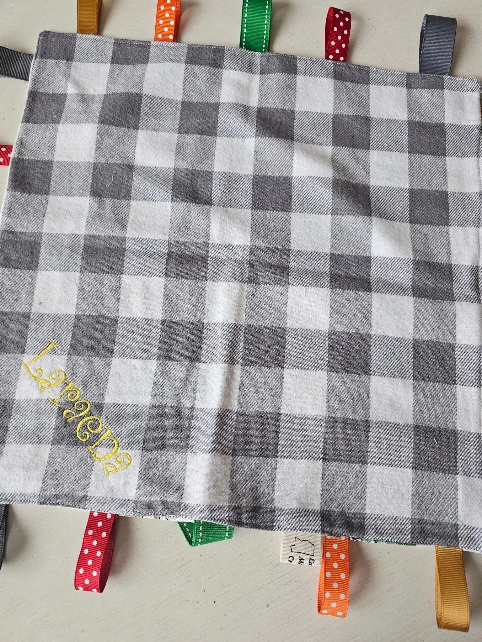 Personalized Gray Checkered Taggy Blanket with Ribbons - Handmade Sensory Baby Blanket by Main Street Collective