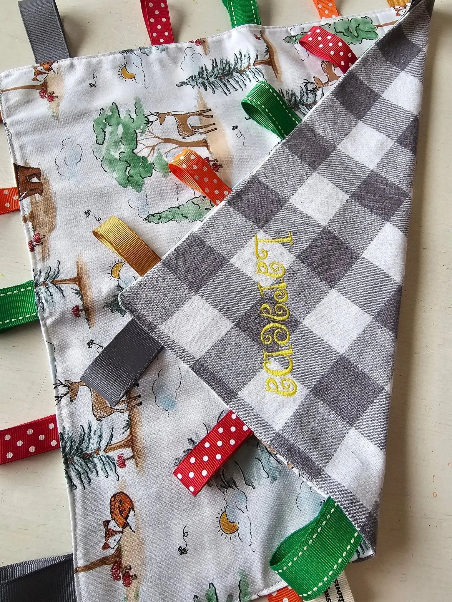 Custom Taggy Blanket: Personalized sensory toy with woodland print & buffalo plaid, handmade in Mississippi by Main Street Collective.