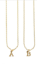 Close-up of Dainty Initial Necklace with gold initial pendant from Keep It Trendy
