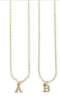 Close-up of Dainty Initial Necklace with gold initial pendant from Keep It Trendy