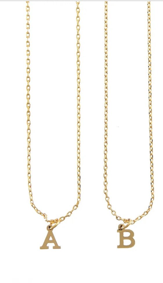 Close-up of Dainty Initial Necklace with gold initial pendant from Keep It Trendy