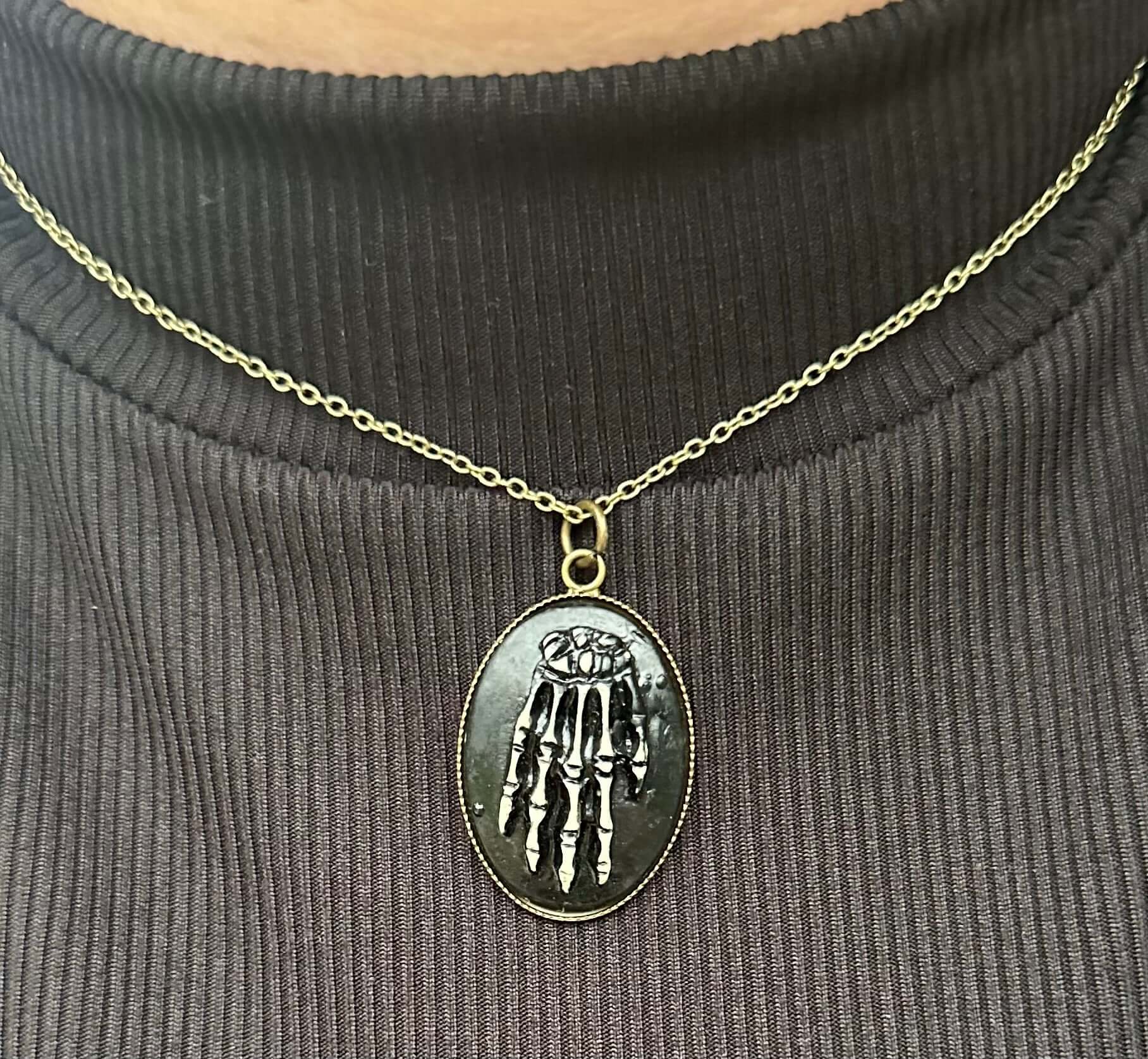 Close-up of oval relic-style pendant on 16 inch chain – Mississippi handmade fantasy jewelry