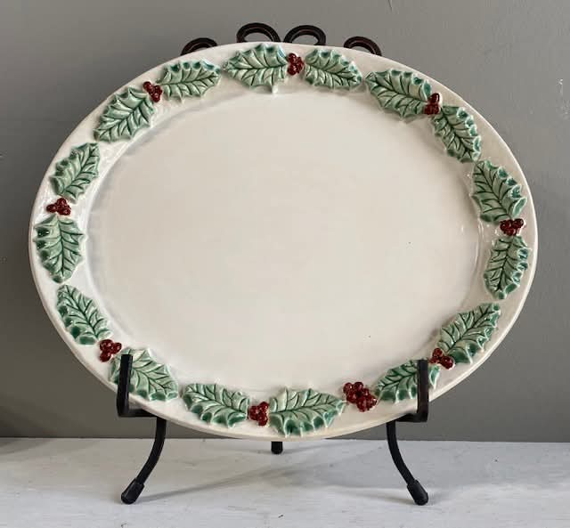 Handmade ceramic Christmas platter with holly leaf design at Main Street Collective, Hattiesburg, MS.