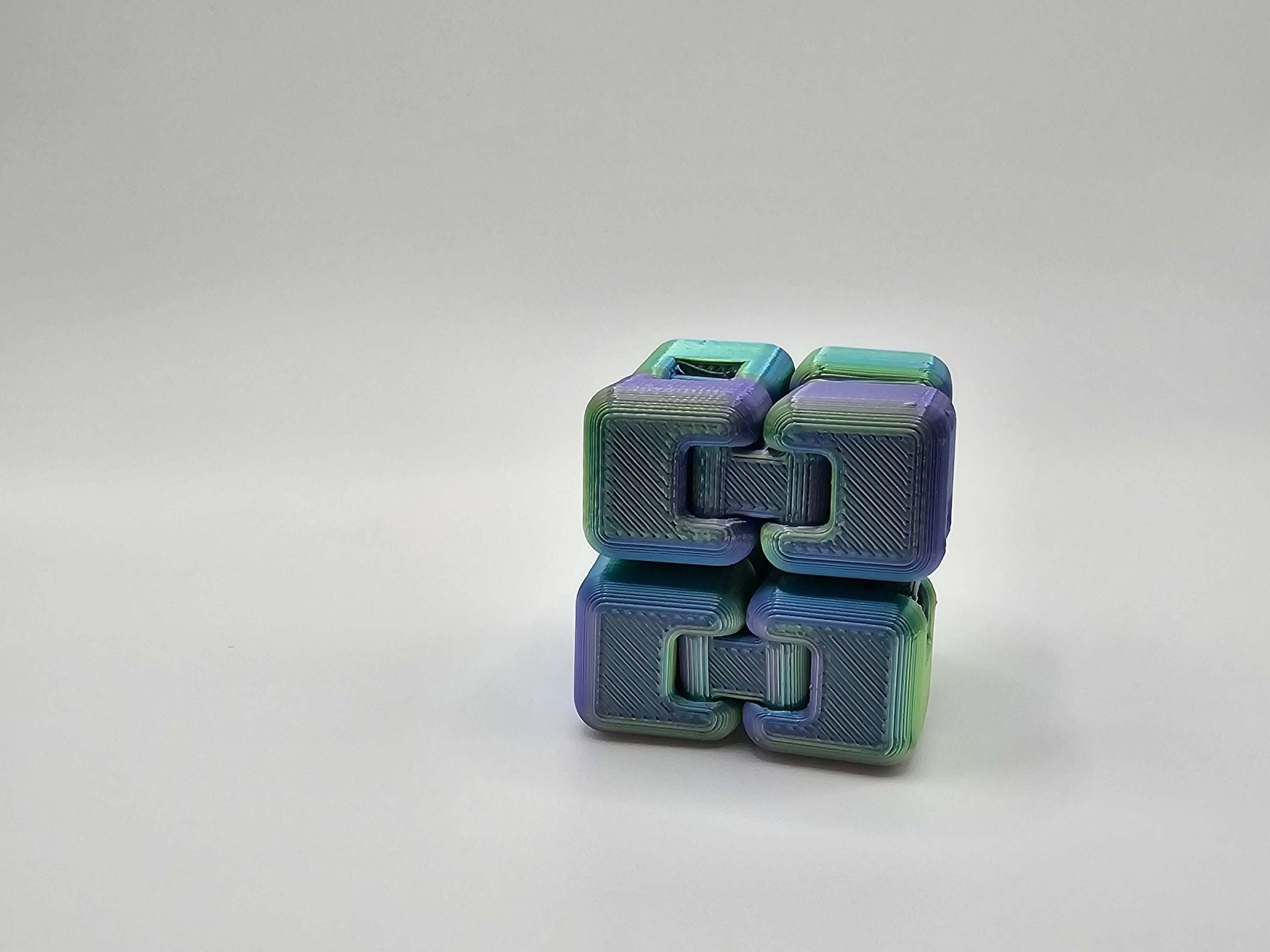 Close-up of folding motion of Infinity Fidget Cube by The Tween Space – Mississippi handmade gifts