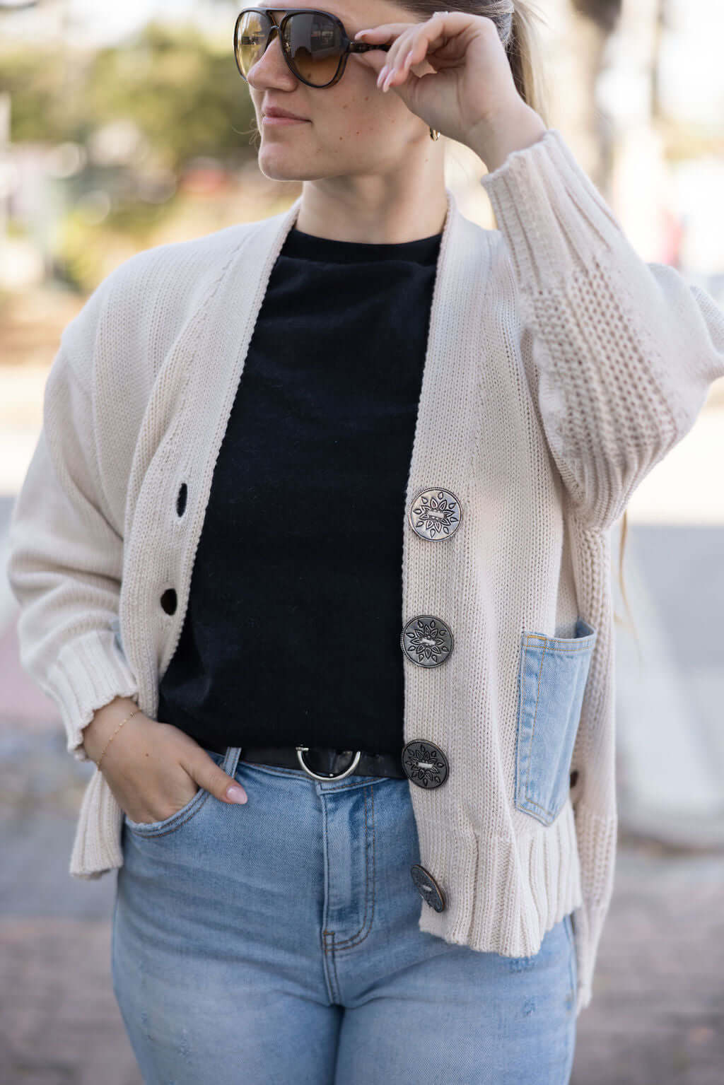 Rolling Stones Upcycled Cardigan. Denim pocket jacket by Keep It Trendy, Main Street Collective Boutique.