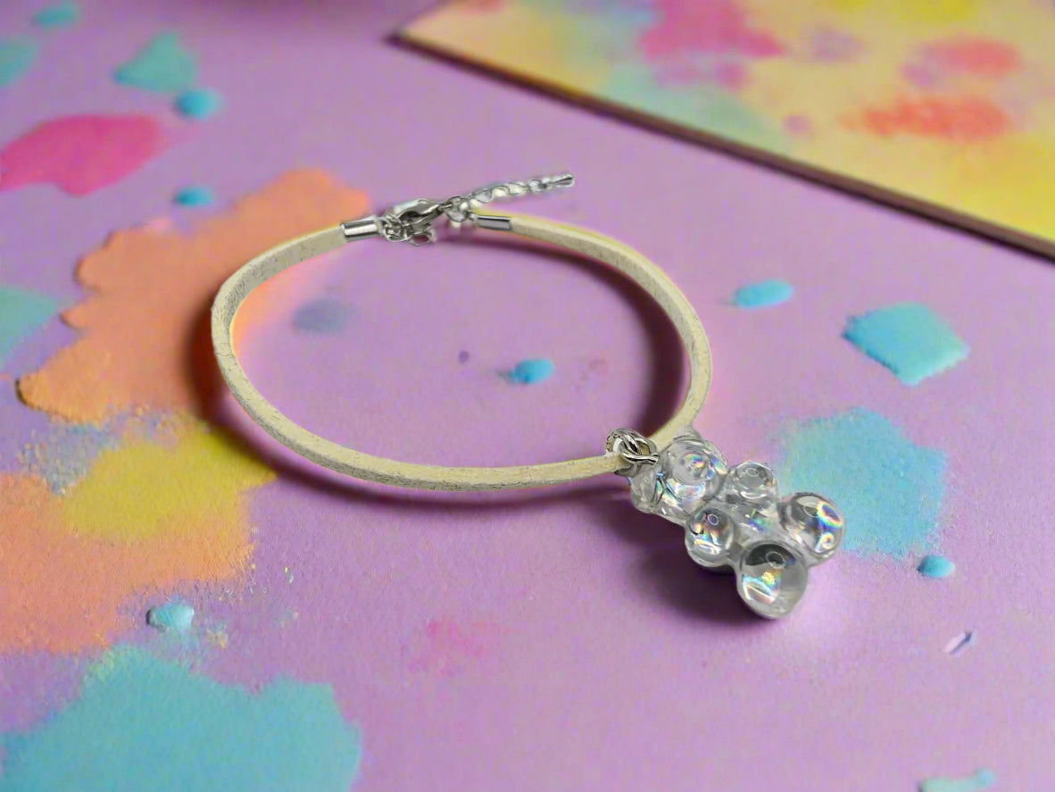 Close-up of lemon yellow and clear iridescent gummy bear charms on bracelets by The Tween Space – Mississippi handmade gifts