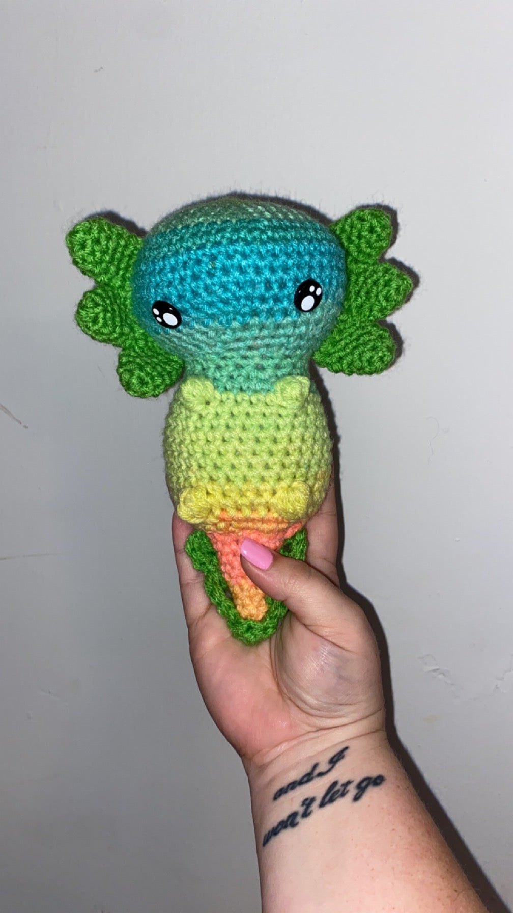 Handmade crochet Ace the Axolotl plush - cute customizable amigurumi toy.