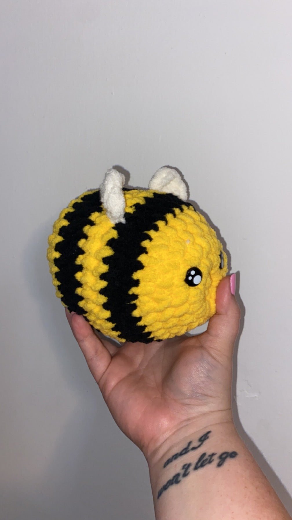 Handmade crochet Benson the Bee plush - soft amigurumi toy.