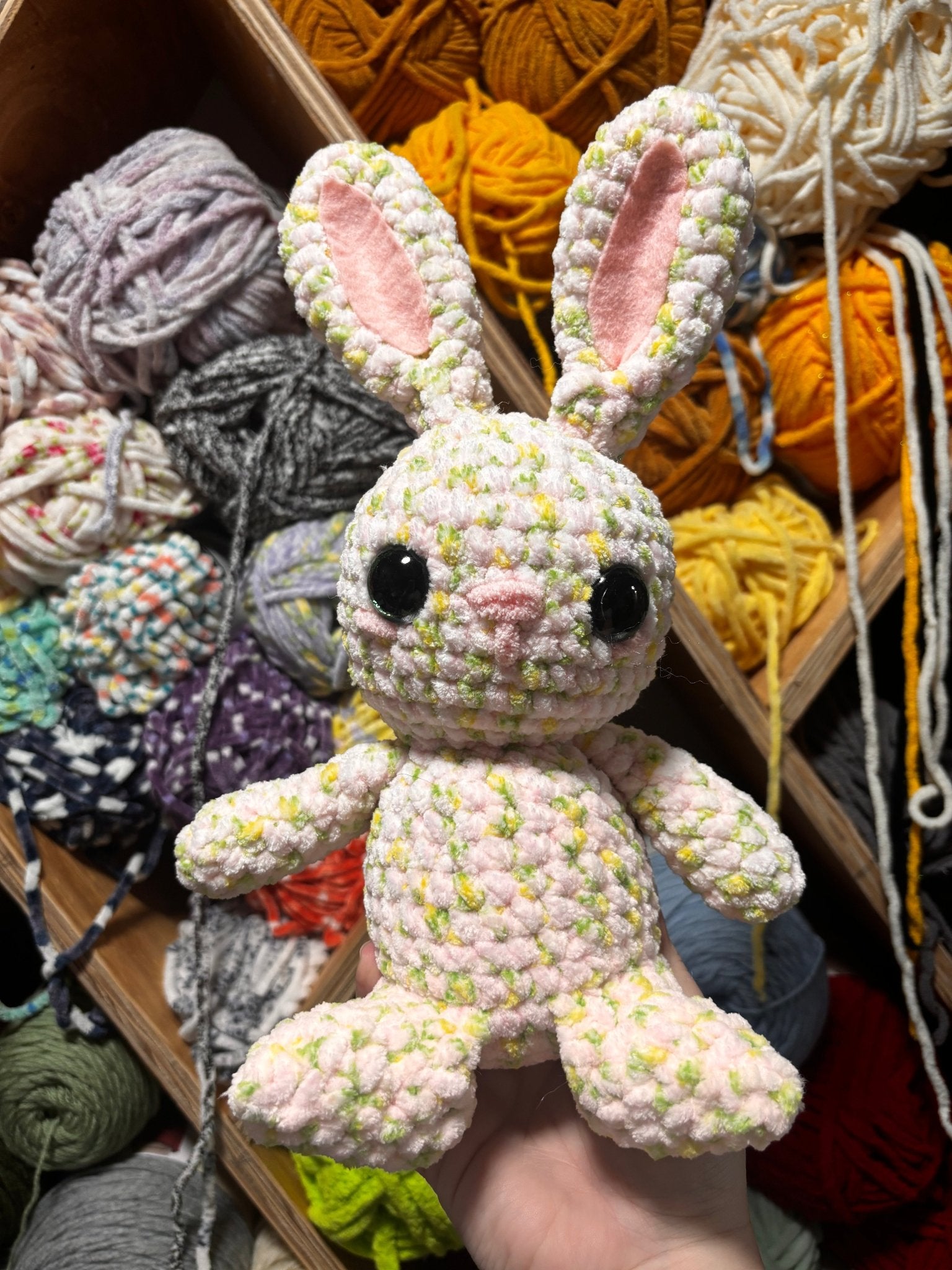 Flower the Rabbit crochet plush with floral patterns and bunny ears.
