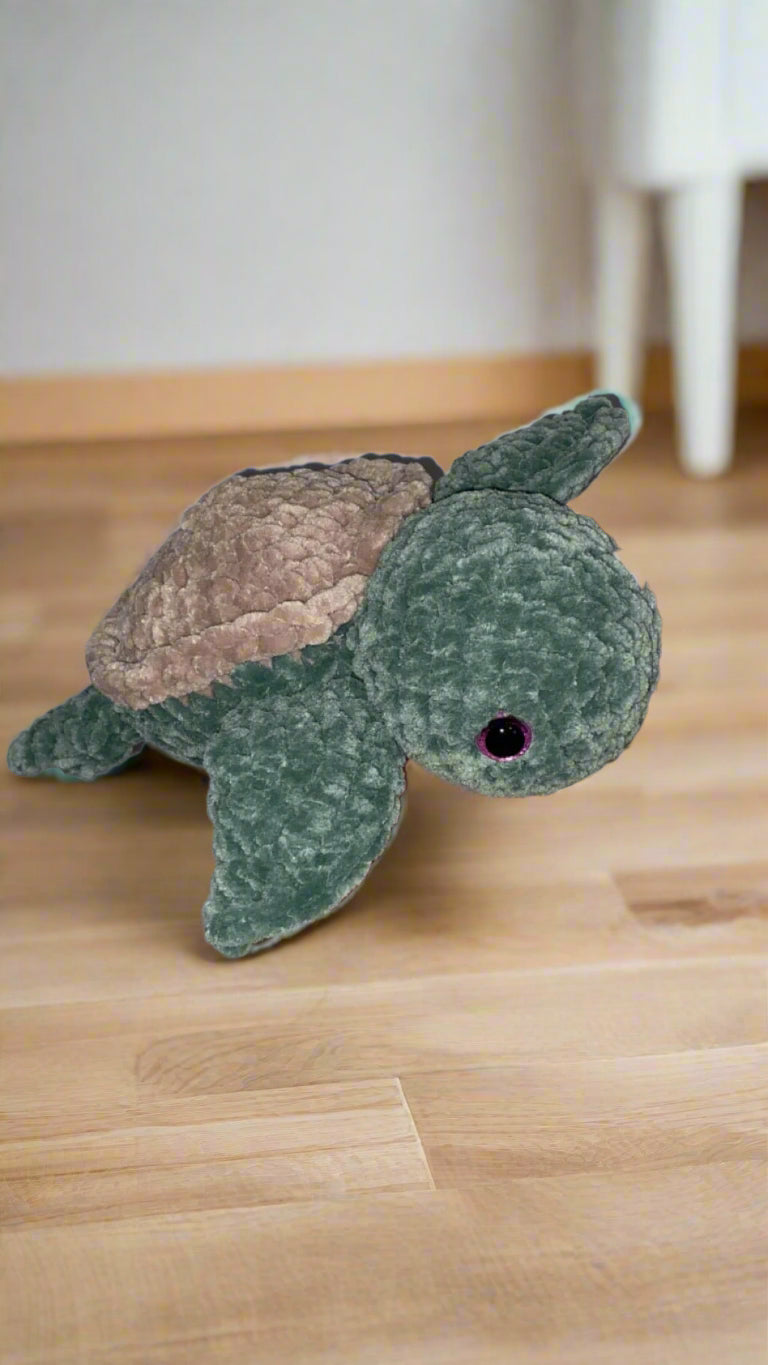 Handmade crochet Shelly the Sea Turtle plush - cute amigurumi toy.