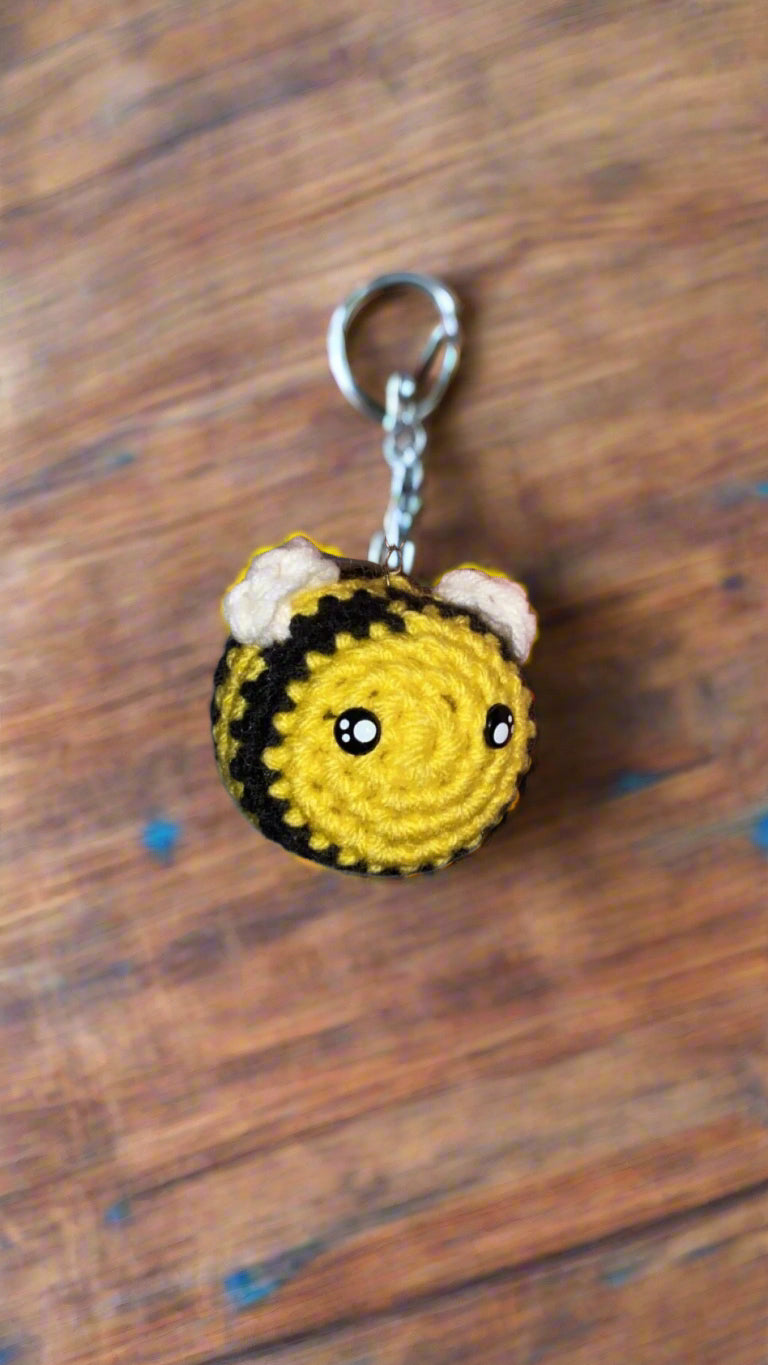Handmade crochet bee keychain - cute and quirky accessory.