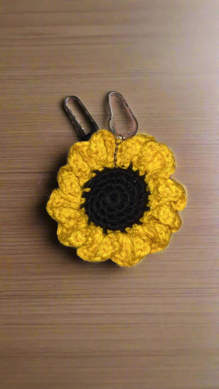 Handmade crochet sunflower keychain - bright and cheerful summer accessory.