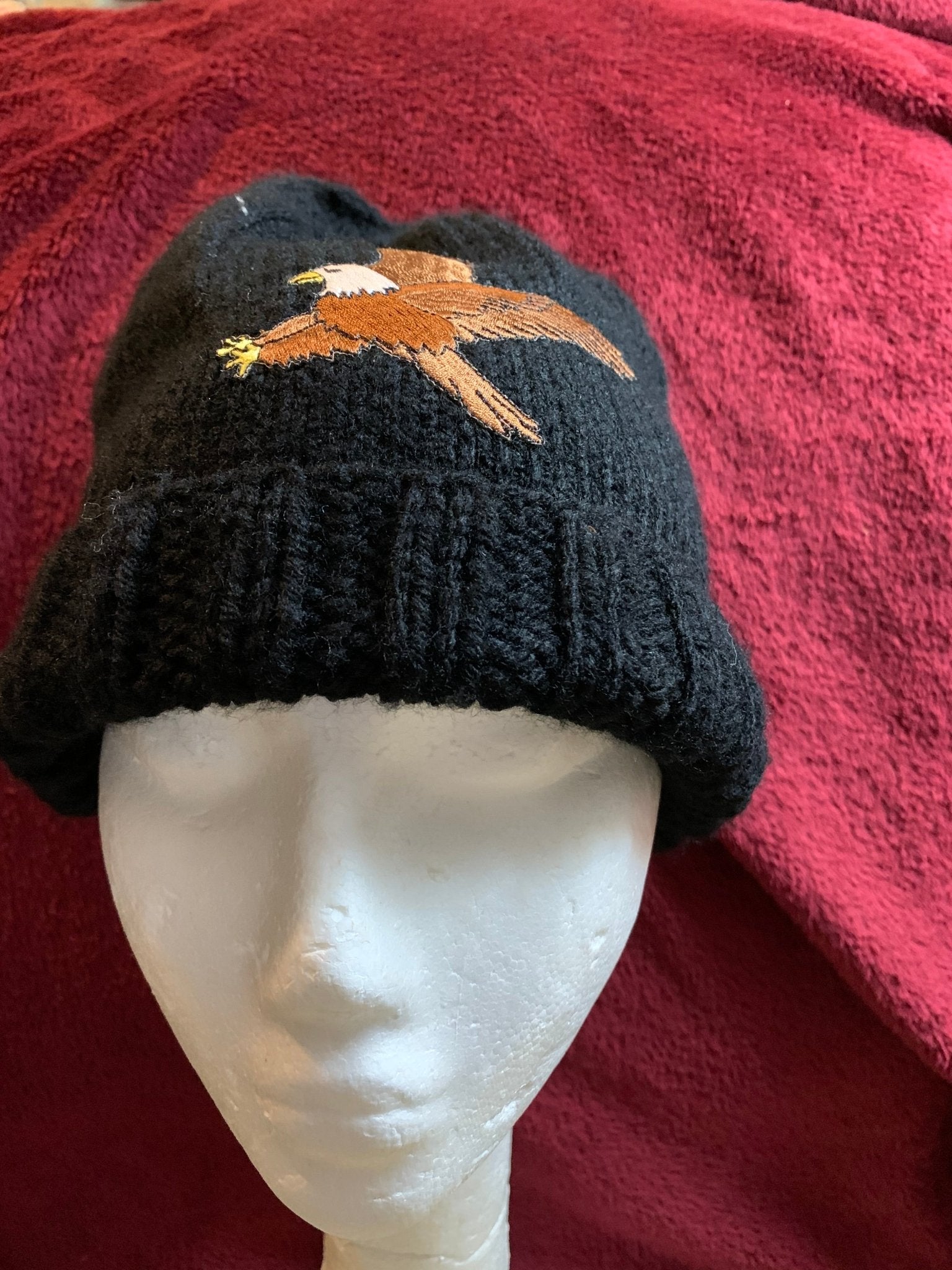 USM Black Beanie Hat with Embroidered Eagle on Mannequin | University of Southern Mississippi Headwear