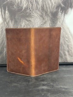 Handmade brown leather notebook by Main Street Collective. Holds 5x7 padfolio, business cards, & paperwork. Custom-made.
