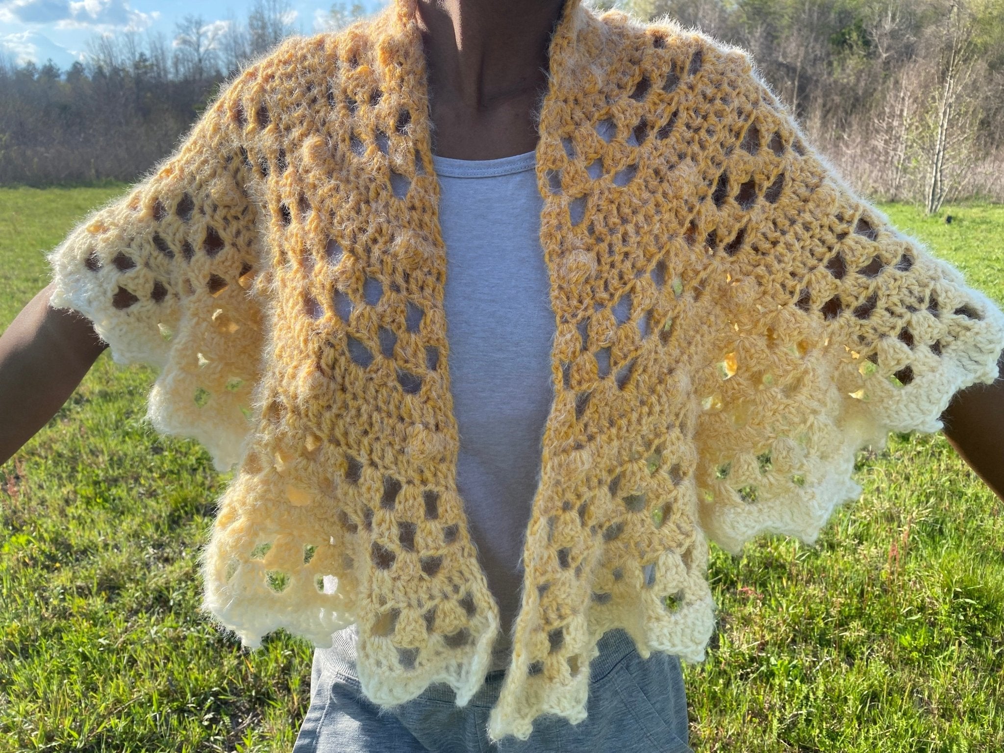 Handmade crochet sun shawl: yellow ombre open-stitch shawl by Main Street Collective.