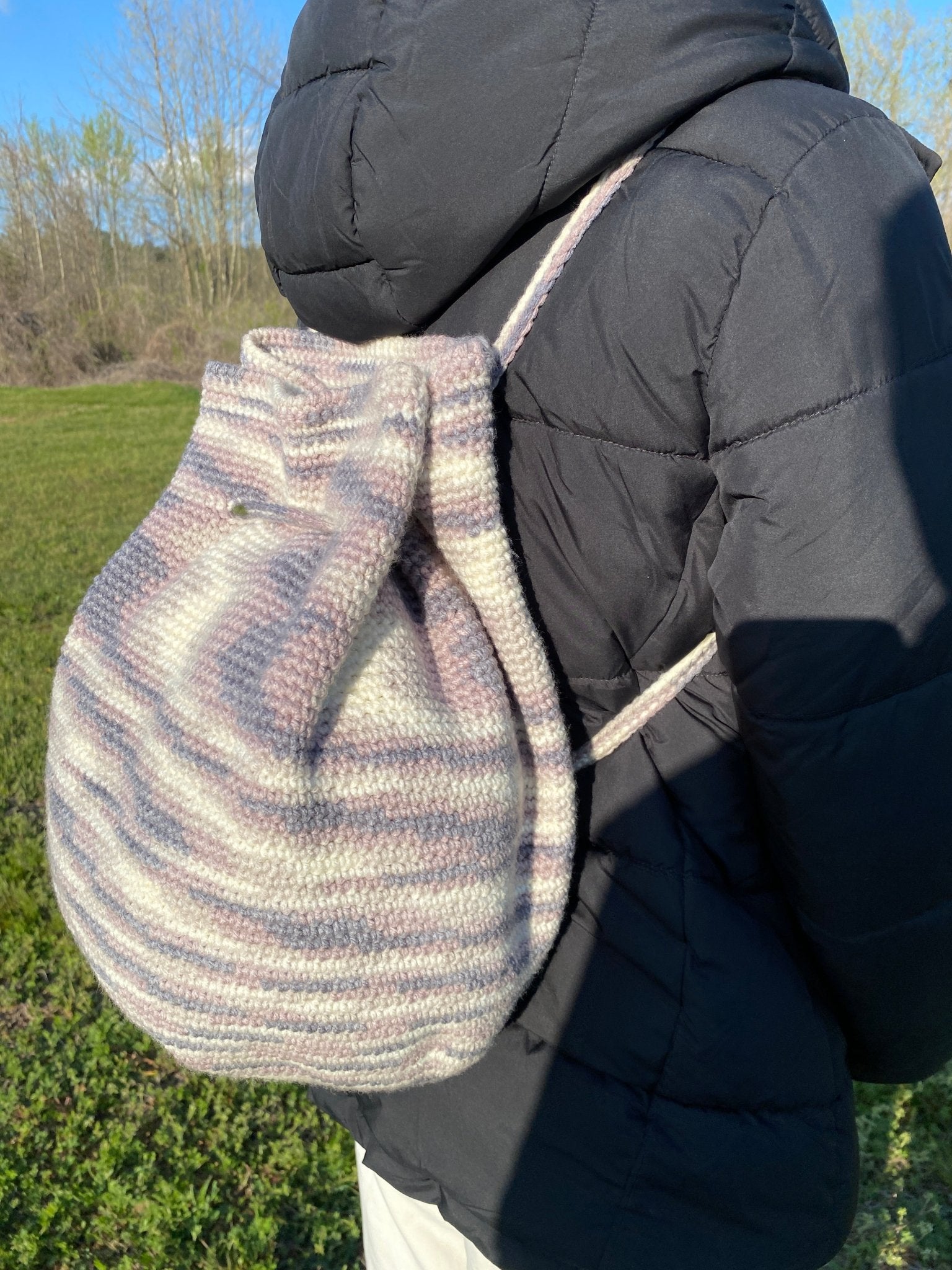 Main Street Collective Zebra Crochet Backpack: Handmade Bag with Drawstring, Convertible Straps, unique pattern.