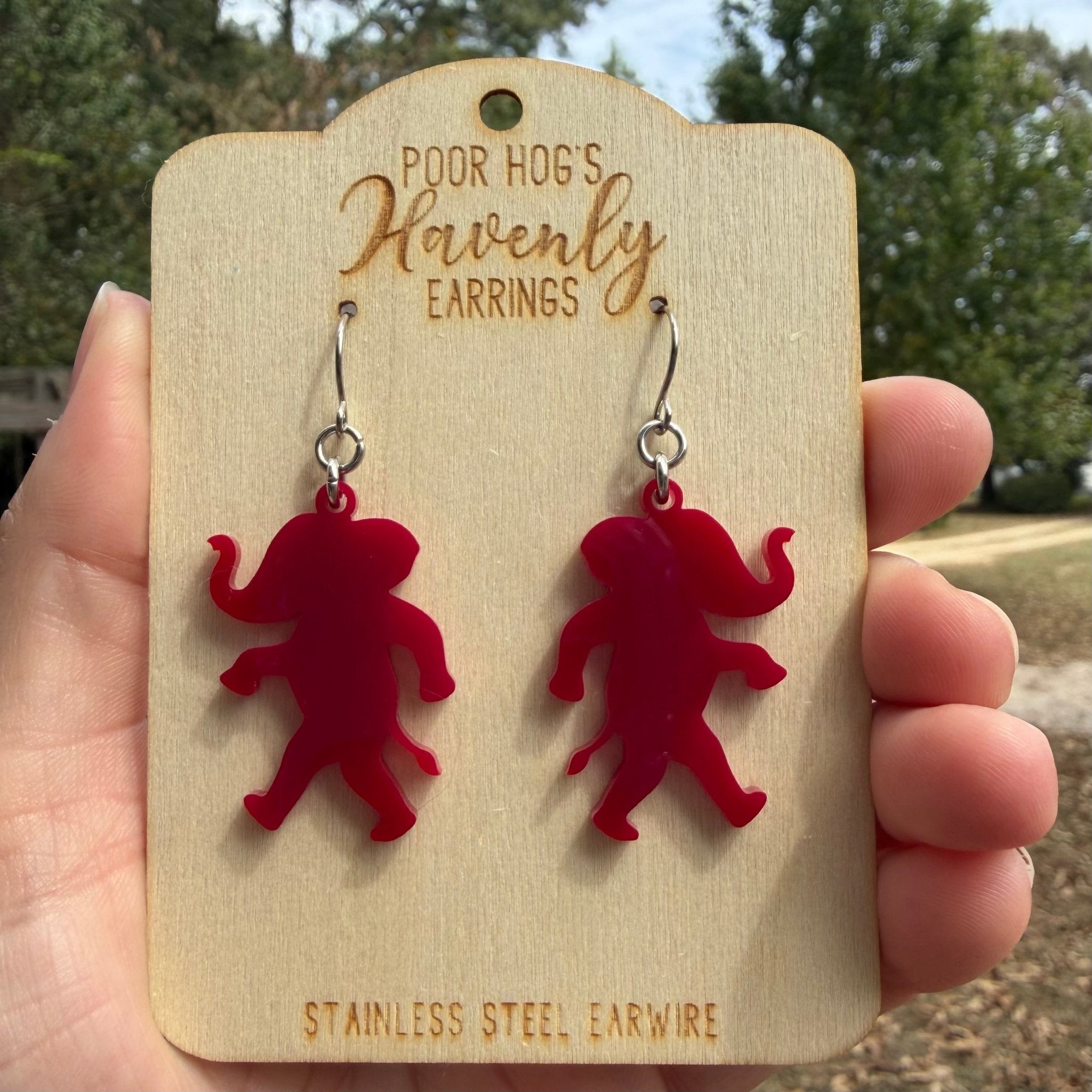 Crimson elephant dangle earrings, acrylic Alabama game day jewelry by Poor Hog's Havenly Earrings at Main Street Collective.