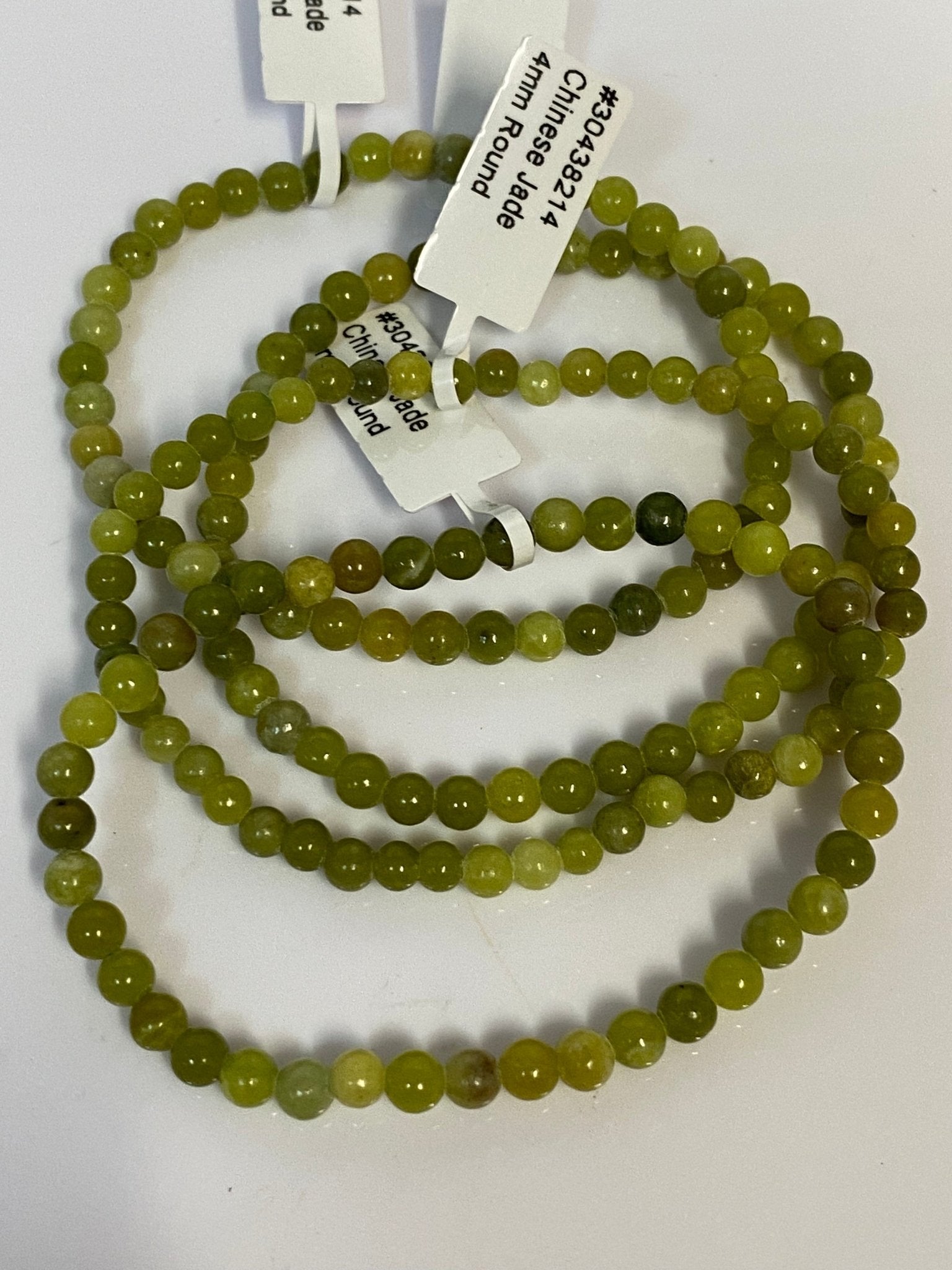 Handmade Jade bracelet with 4mm soft green gemstone beads from Hands of Earth Energy